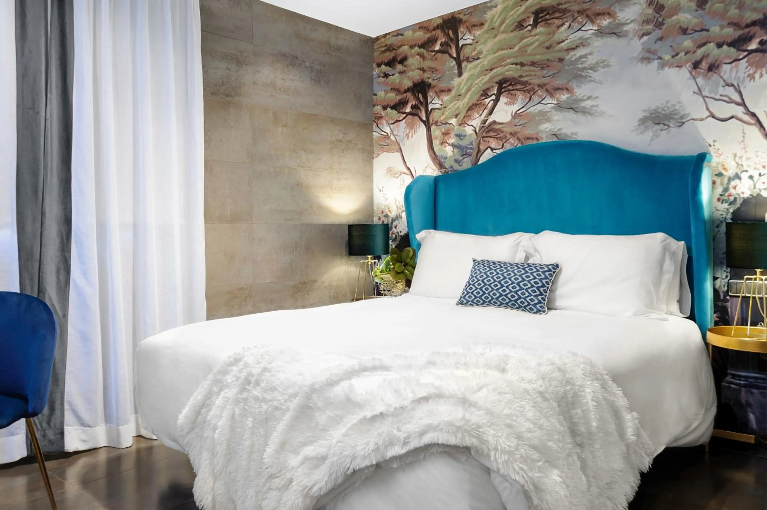 Bed in Hotel Los Girasoles by Maxi Hoteles