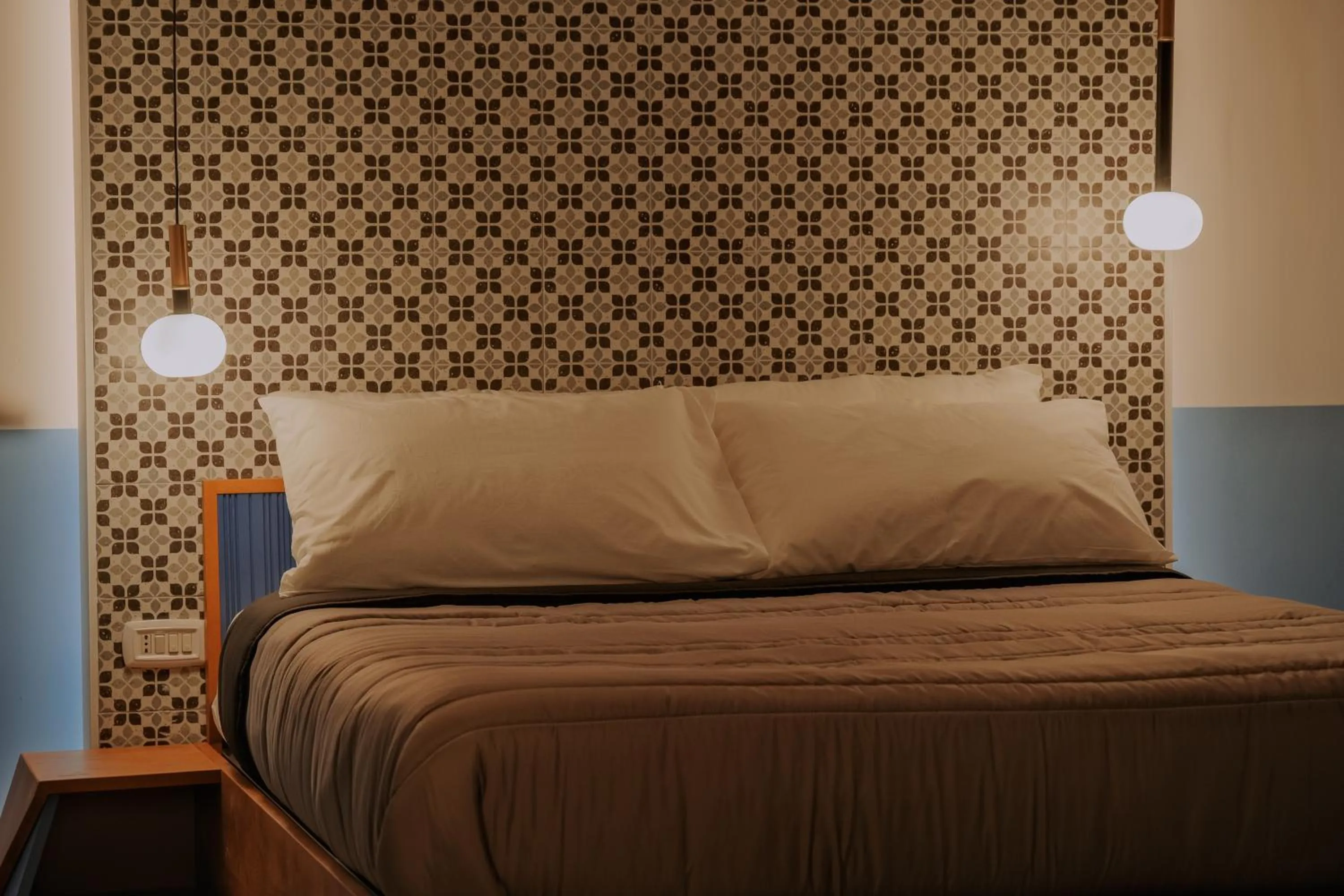 Bed in Occhi di Napoli Experiential Relais