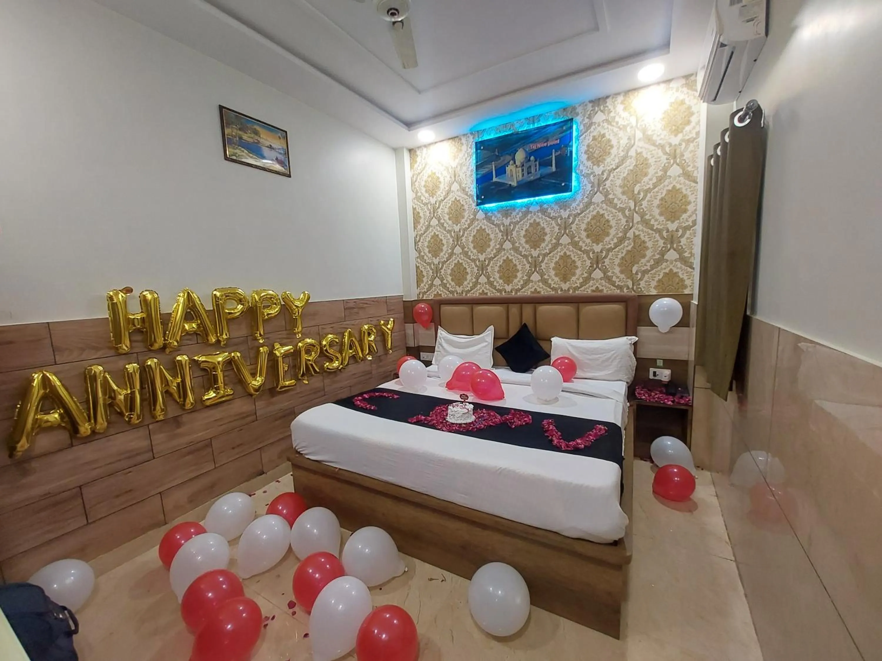 Photo of the whole room, Bed in Taj Nice Point Manage by Taj Sunrise Group