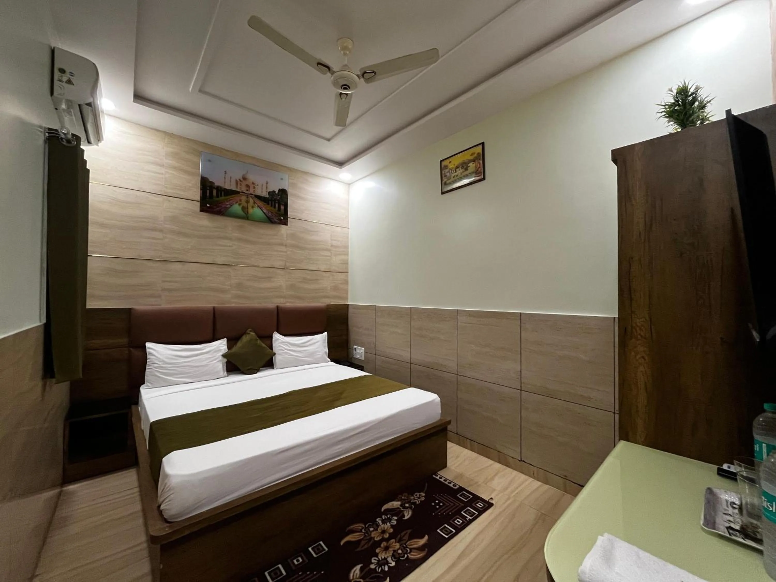 Photo of the whole room, Bed in Taj Nice Point Manage by Taj Sunrise Group