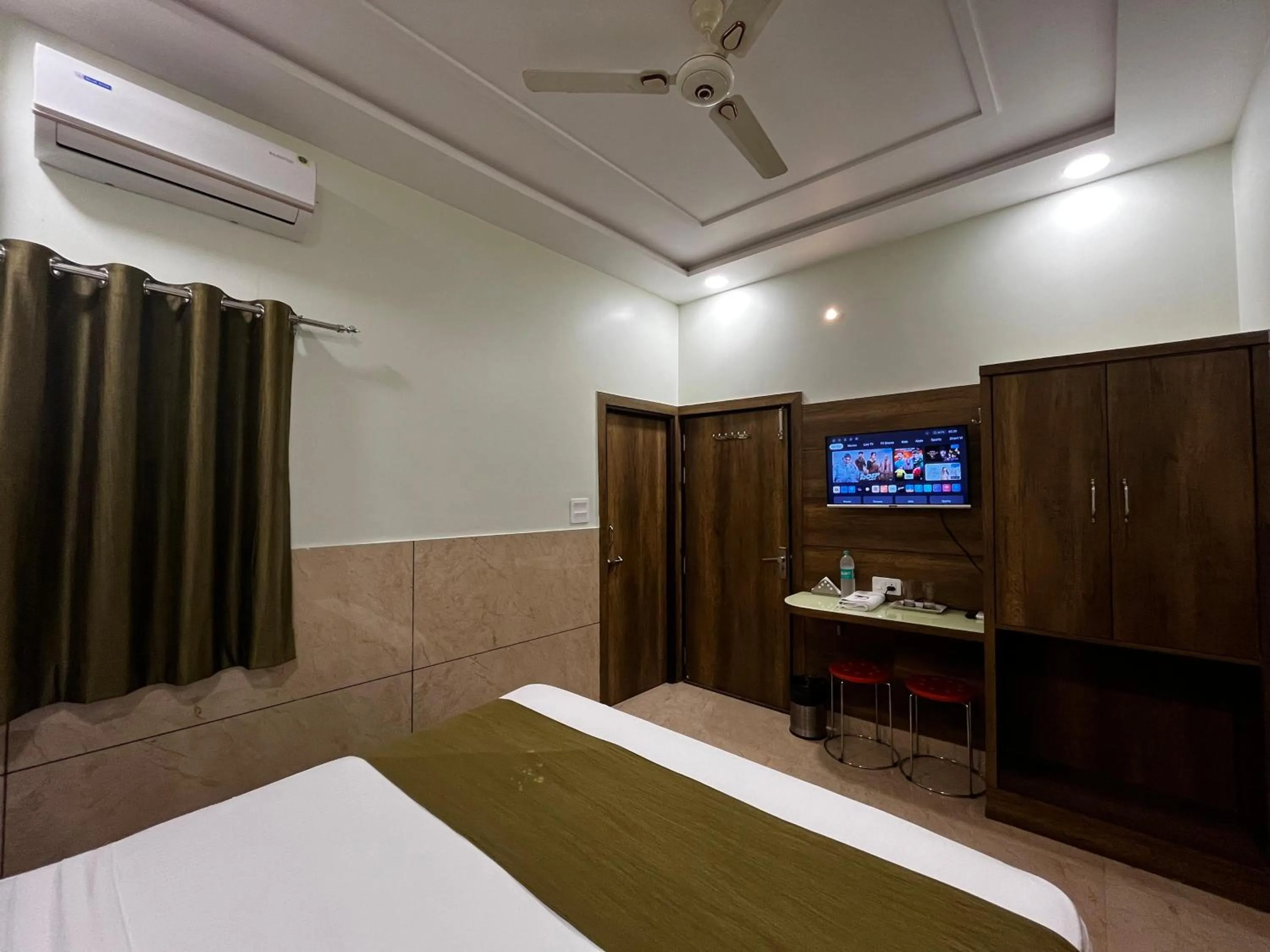 Photo of the whole room, Bed in Taj Nice Point Manage by Taj Sunrise Group