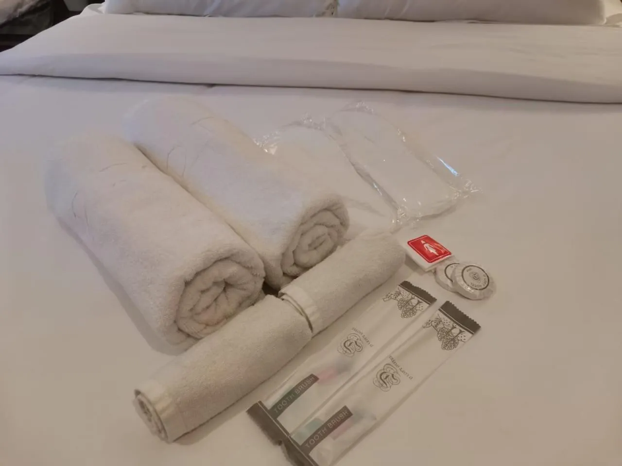 towels, Bed in D Loft Hotel