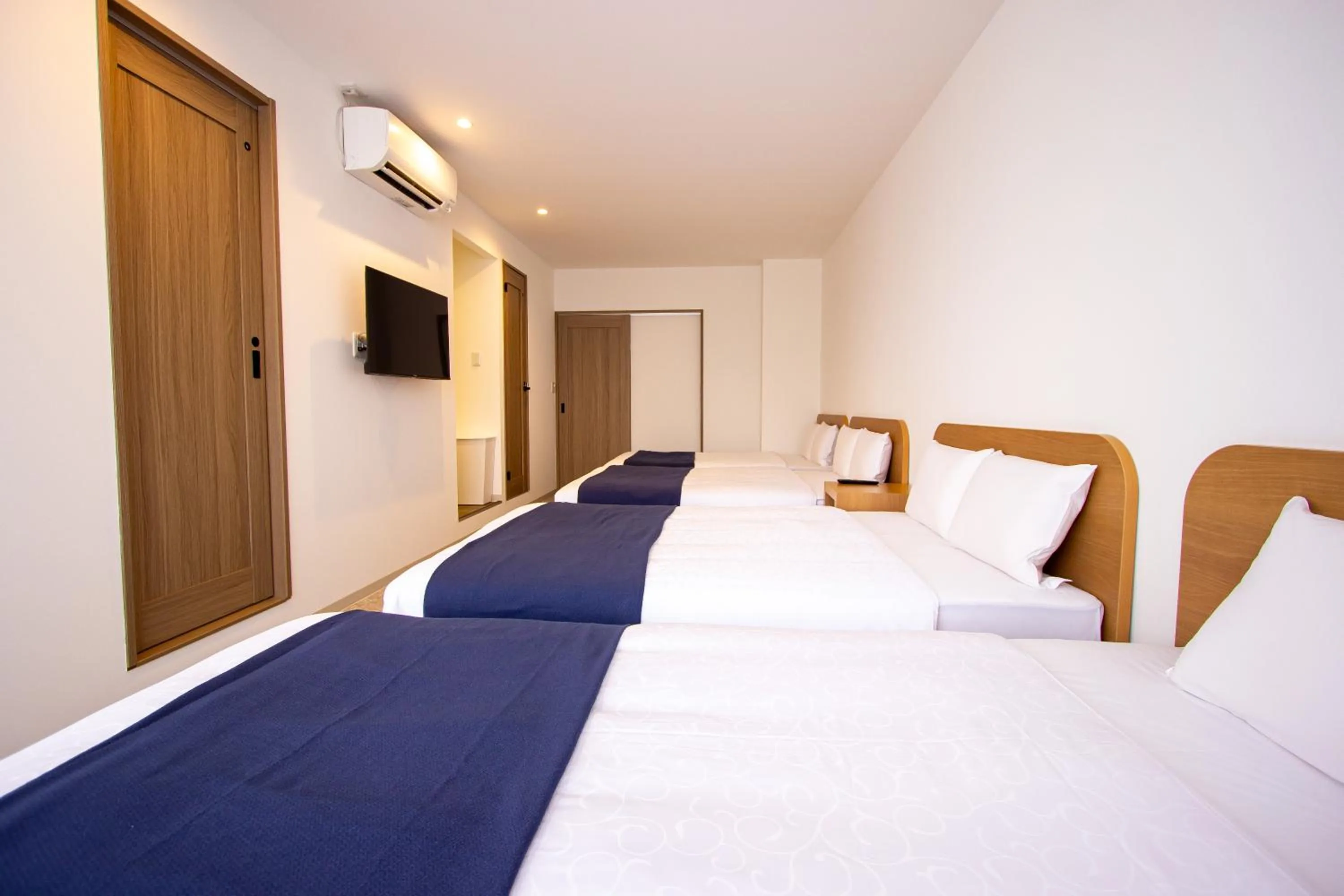 Bedroom, Bed in HIRO BUILDING Apartment Stay