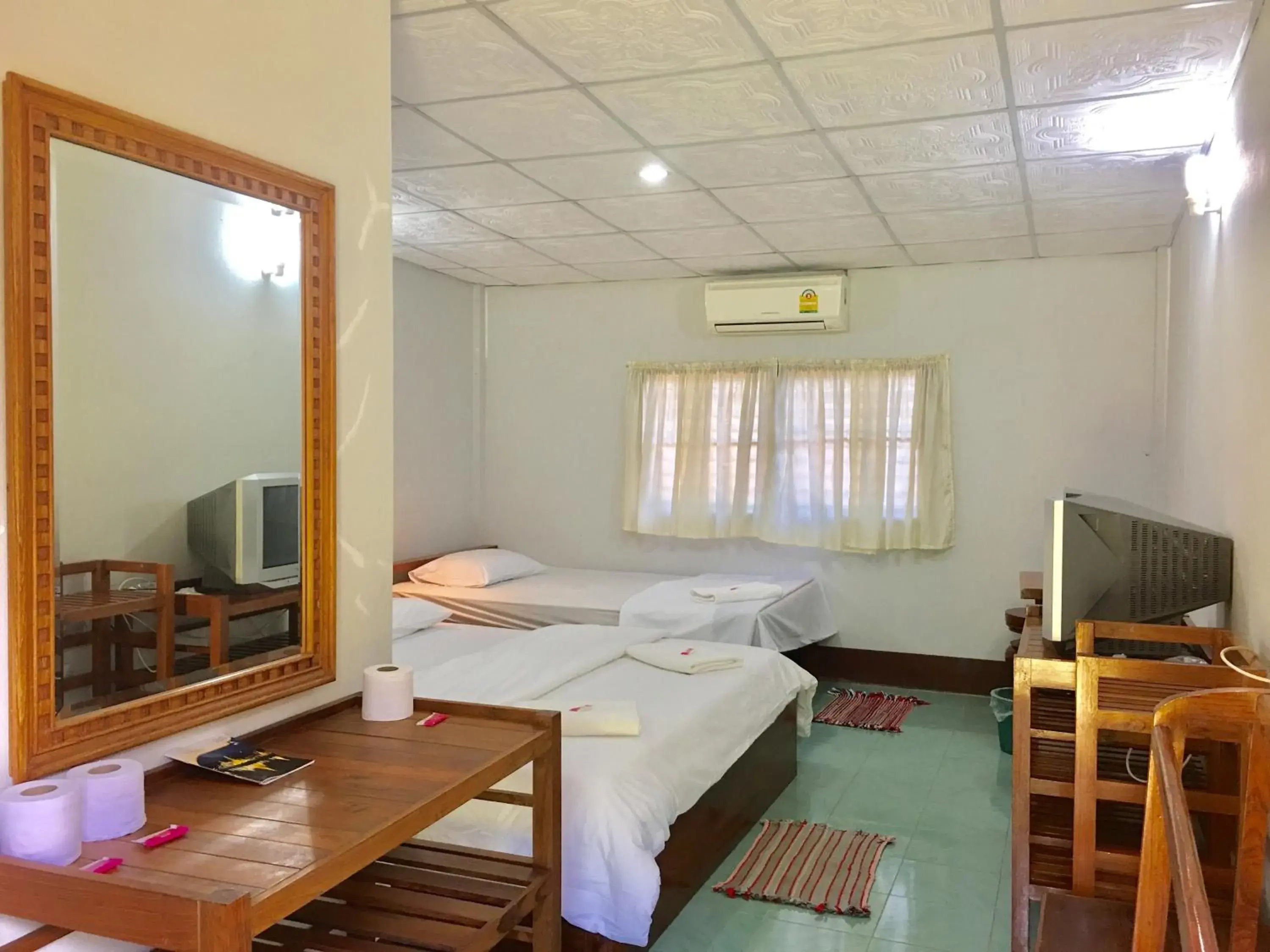 Triple Room in The Creek Garden Huainamrin Resort Triple Room in The Creek Garden Huainamrin Resort