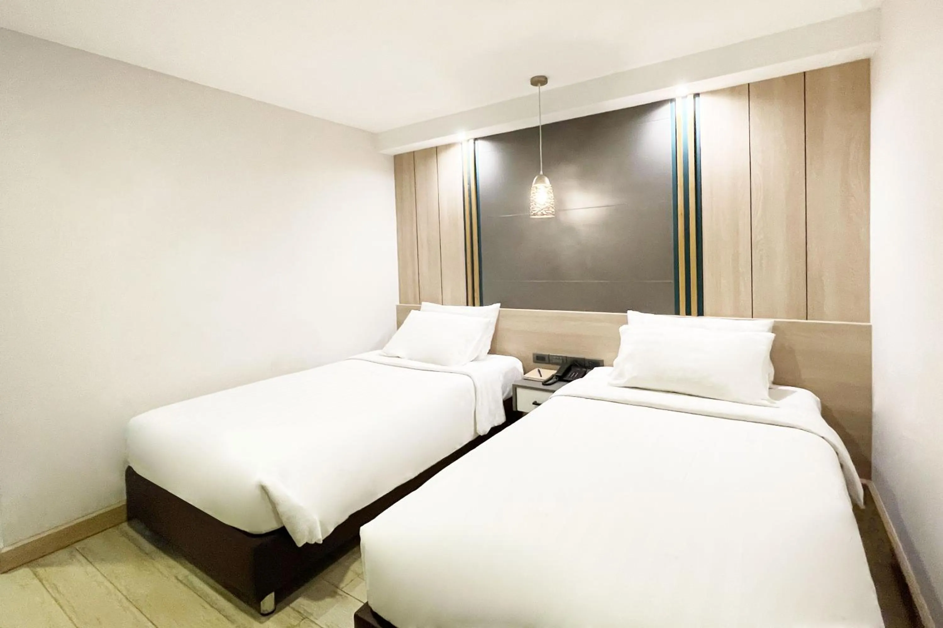 Bed in City Park Hotel Bangkok Pratunam by PCL
