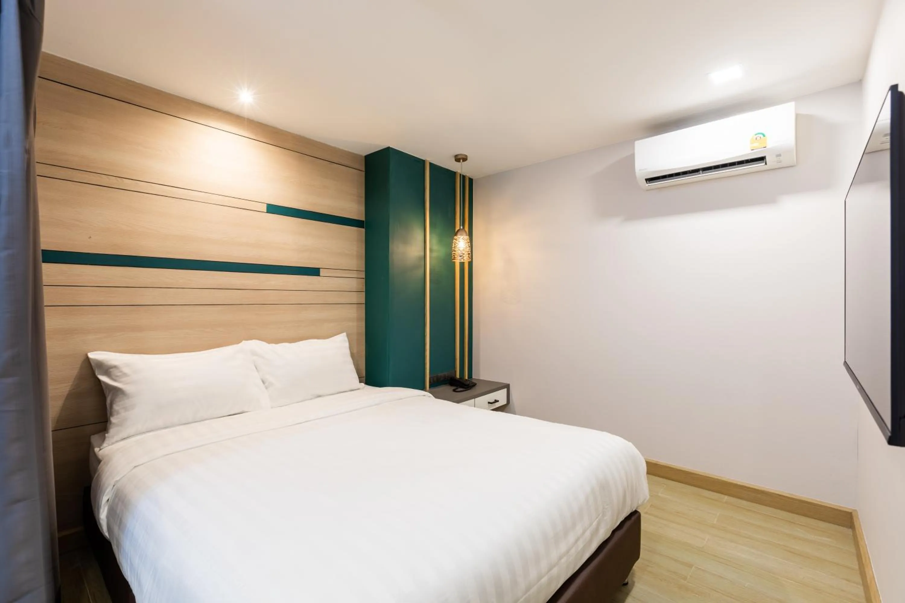 Bed in City Park Hotel Bangkok Pratunam by PCL