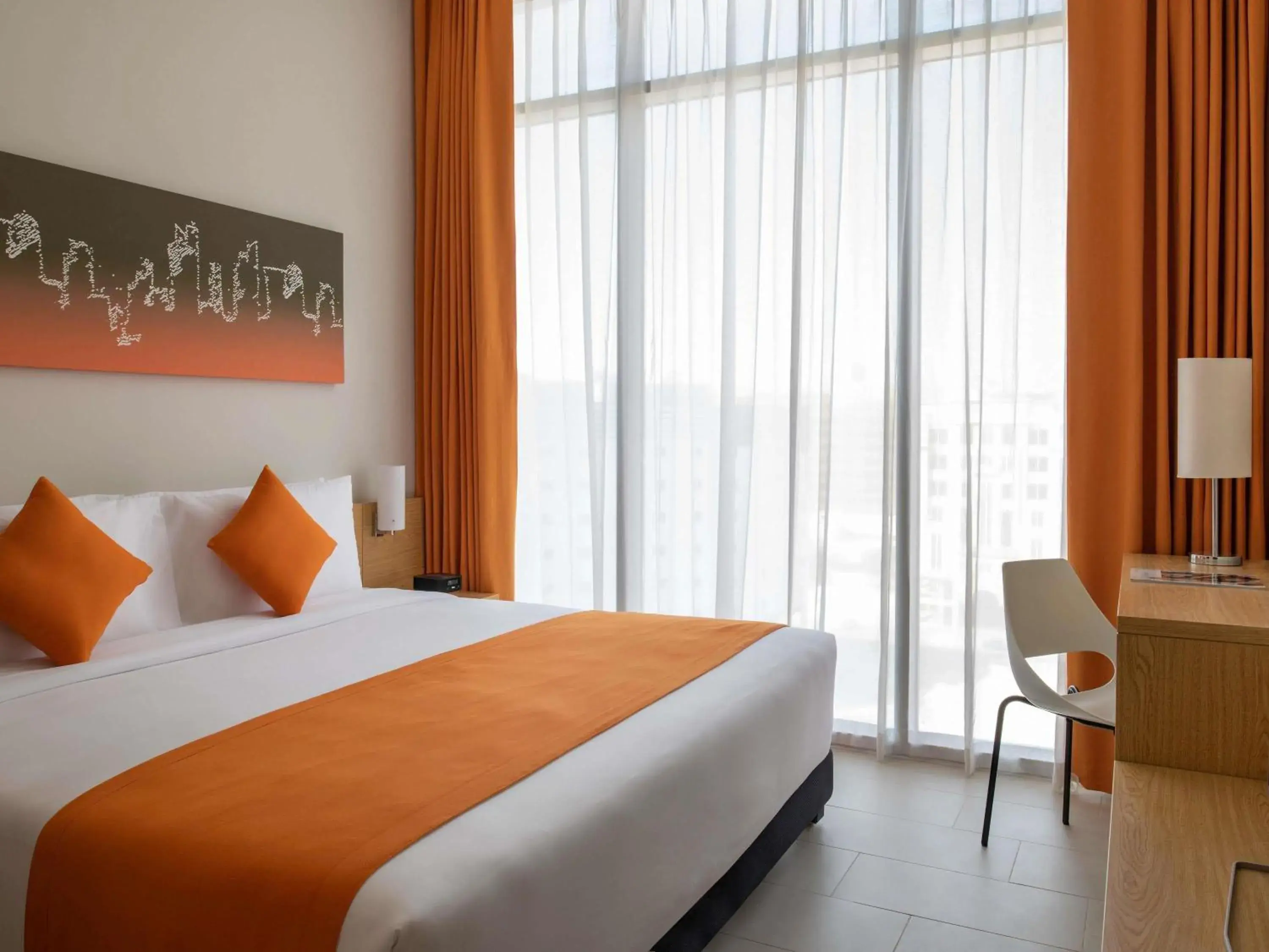 One Bedroom Apartment with One King Bed and One Sofabed in Adagio Doha One Bedroom Apartment with One King Bed and One Sofabed in Adagio Doha