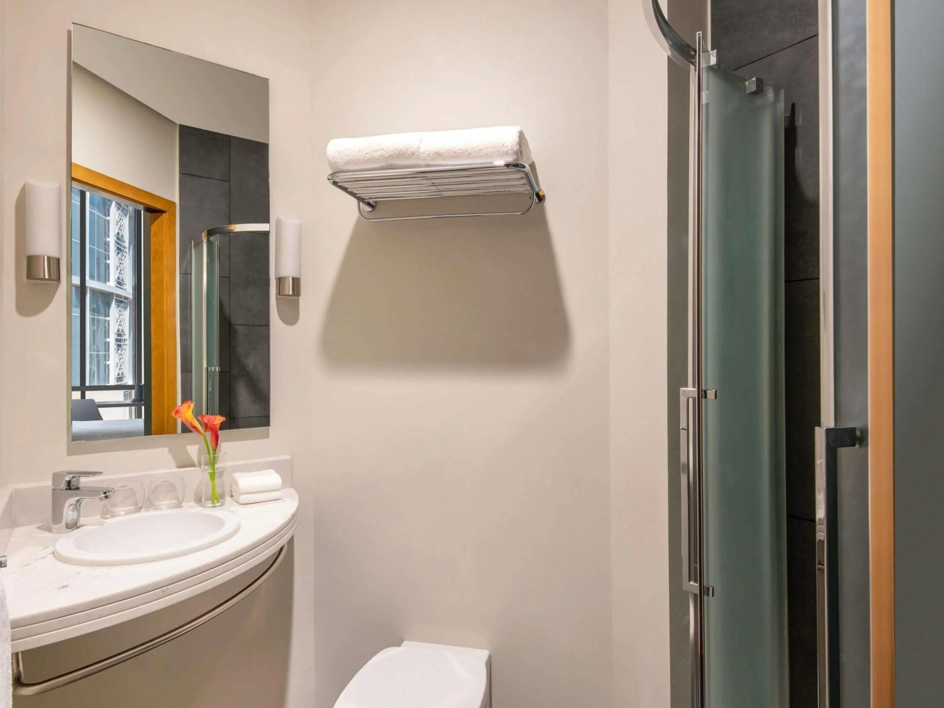 Bedroom in ibis Doha