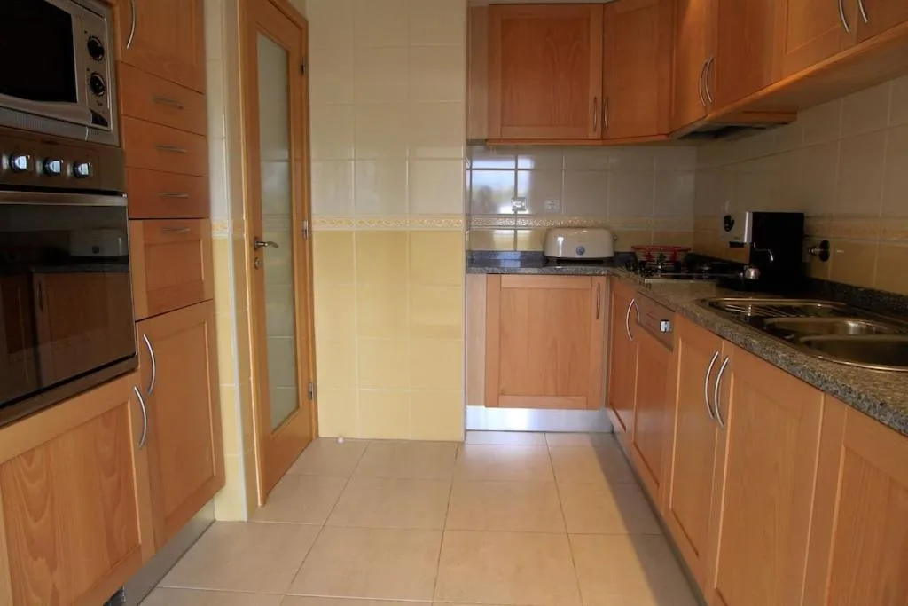Kitchen or kitchenette in Apartamentos Primavera - Praia da Rocha