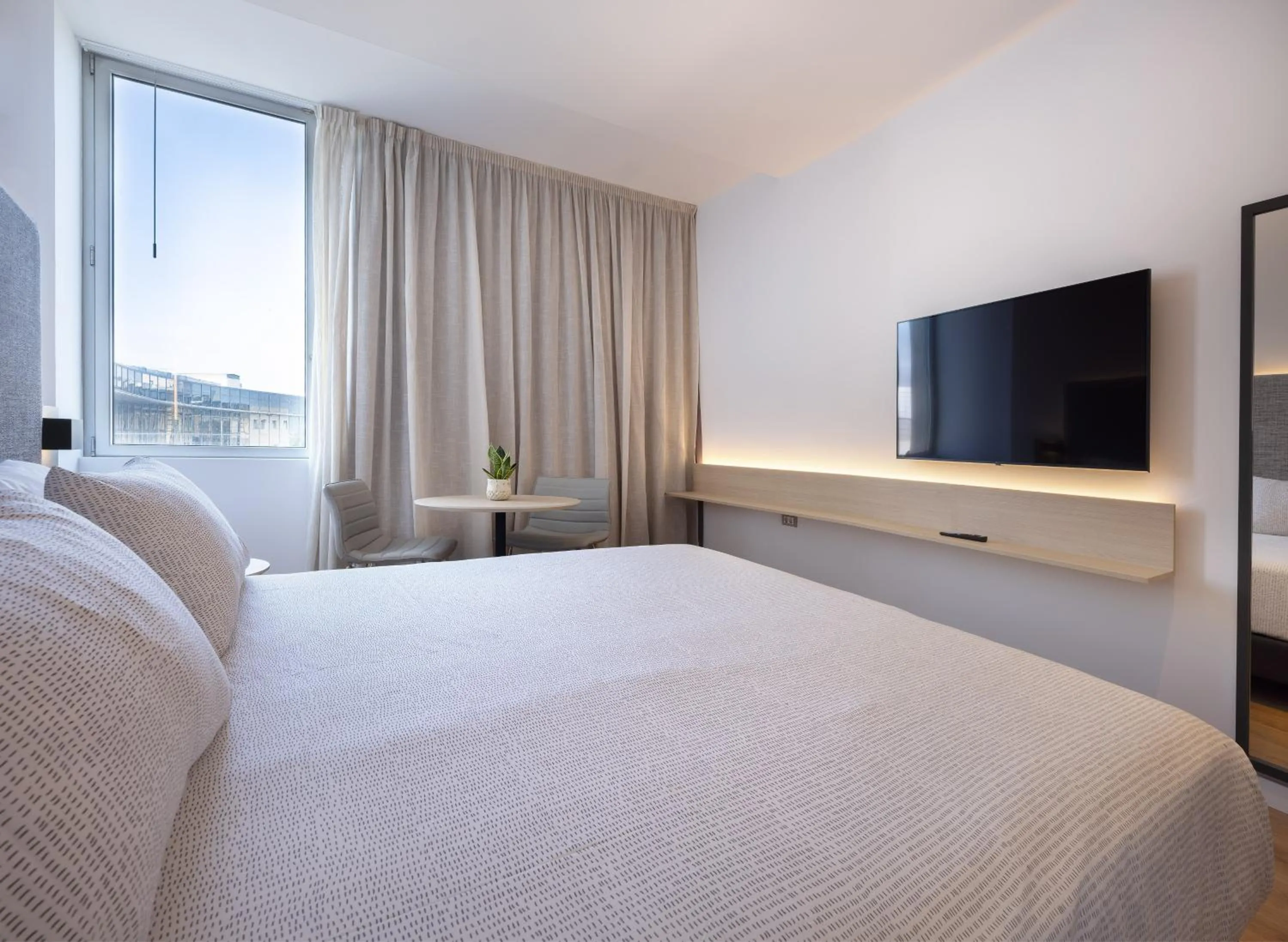 Bed in INNSiDE by Meliá Barcelona Aeropuerto