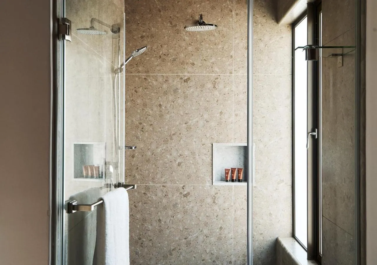 Shower in Letamo at Qwabi Private Game Reserve by NEWMARK