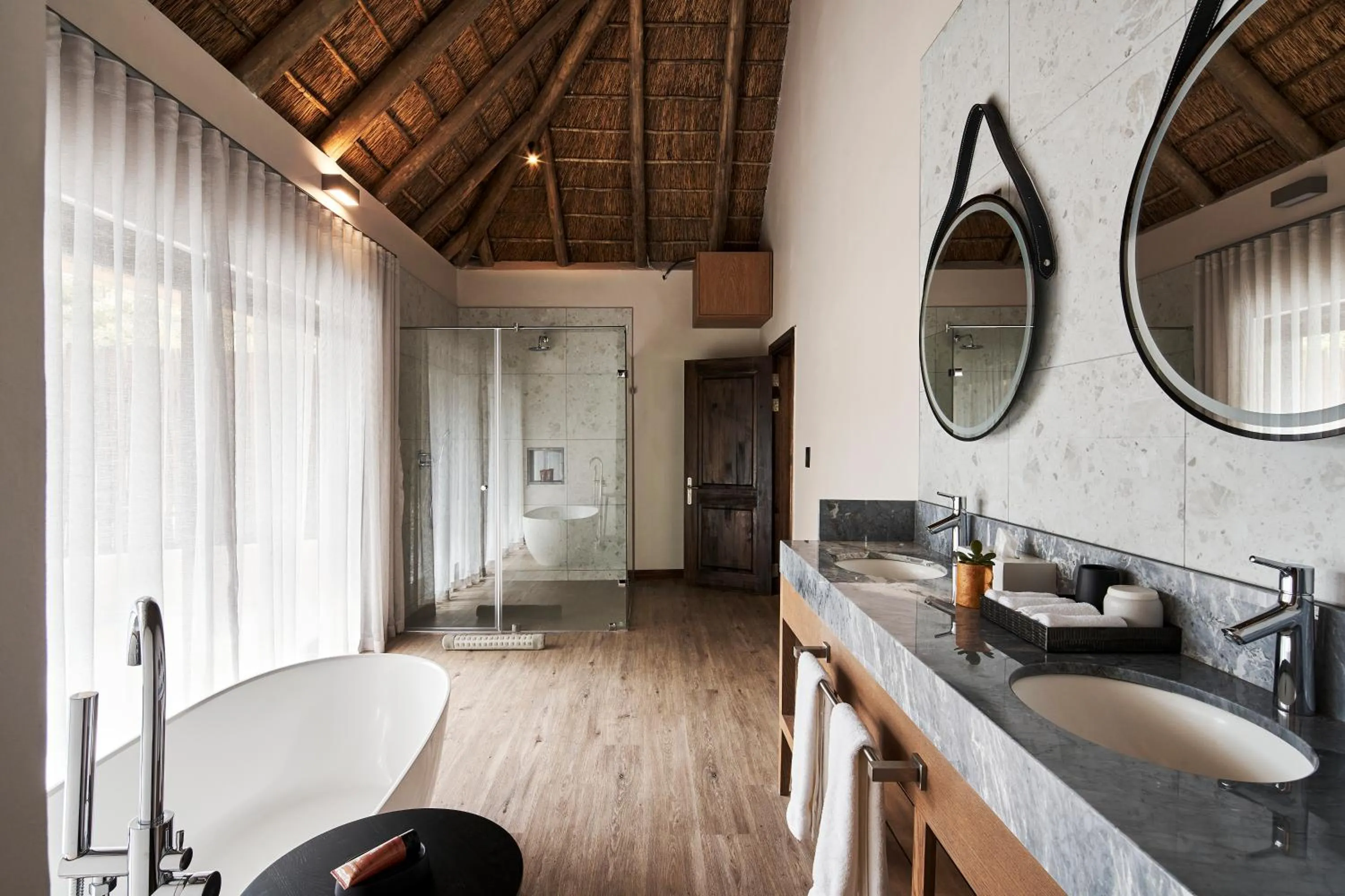 Bathroom in Letamo at Qwabi Private Game Reserve by NEWMARK