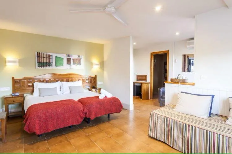 Bed in Hotel Alcadima