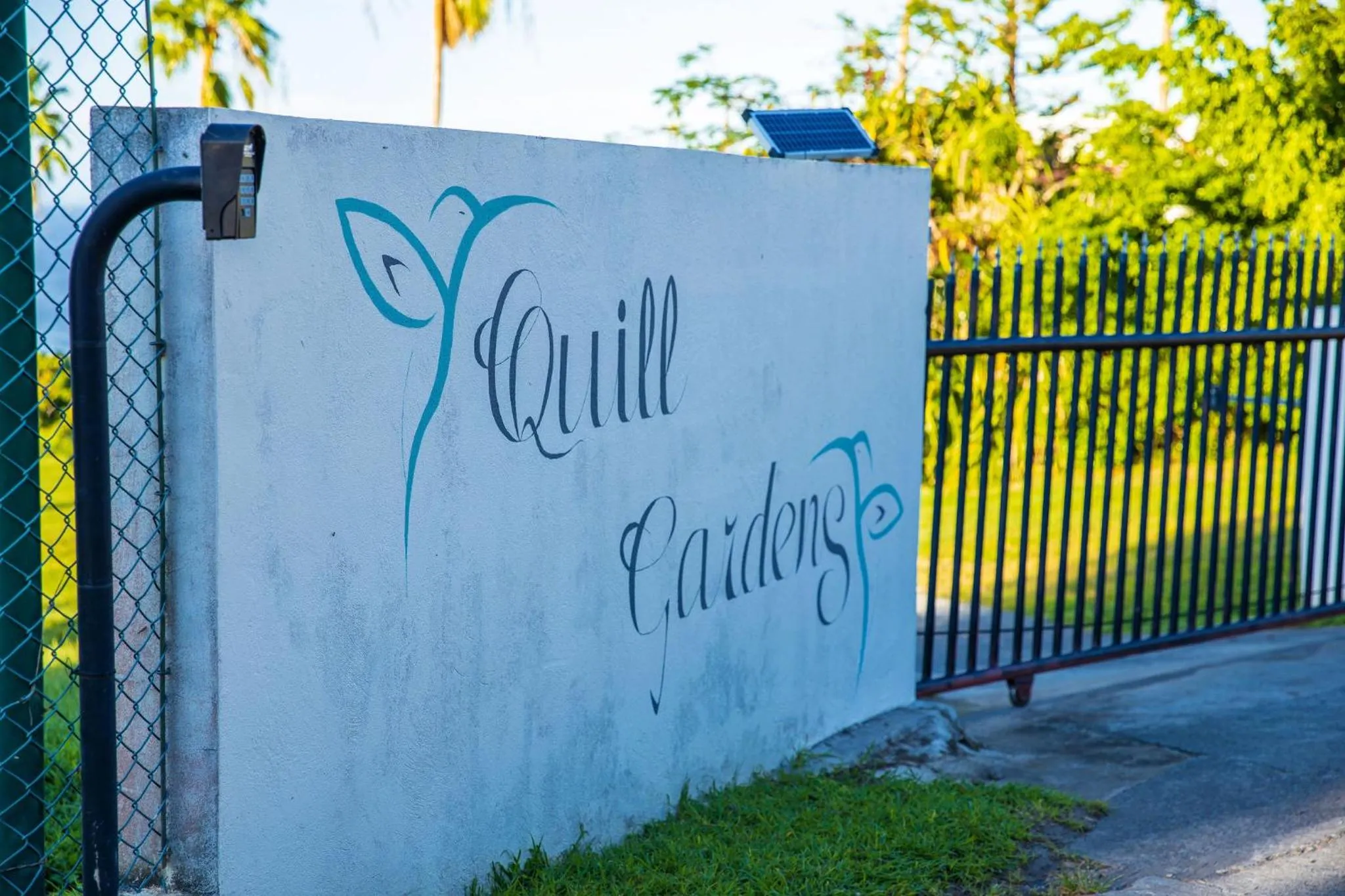 Property logo or sign in Quill Gardens Boutique Hotel