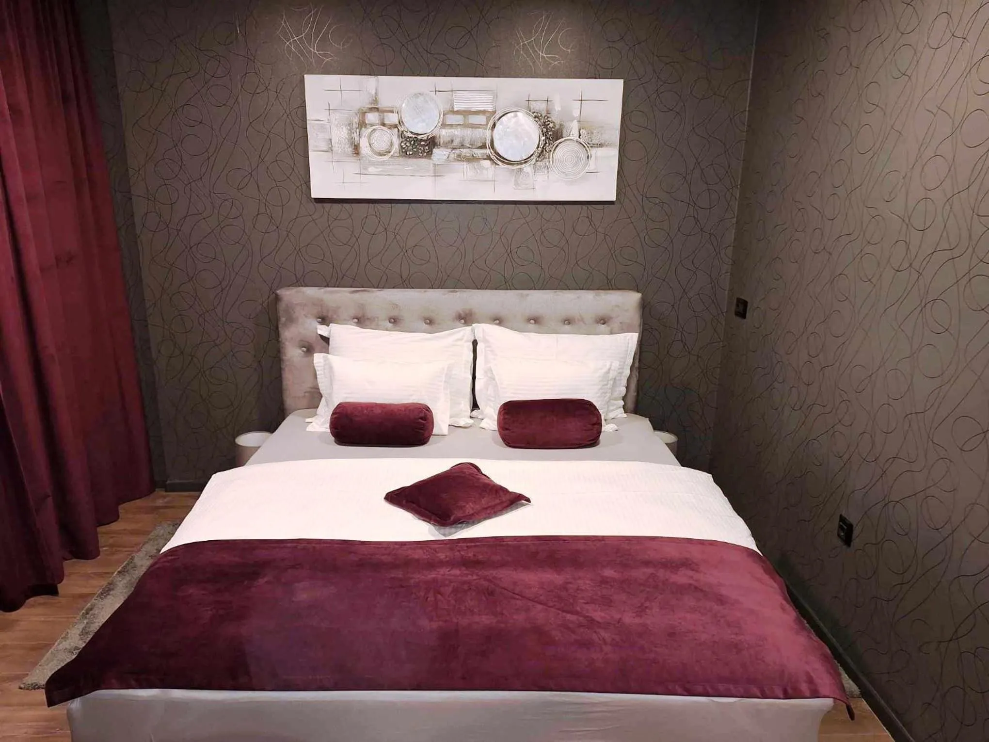 Bed in Arcobaleno Apartments & Rooms