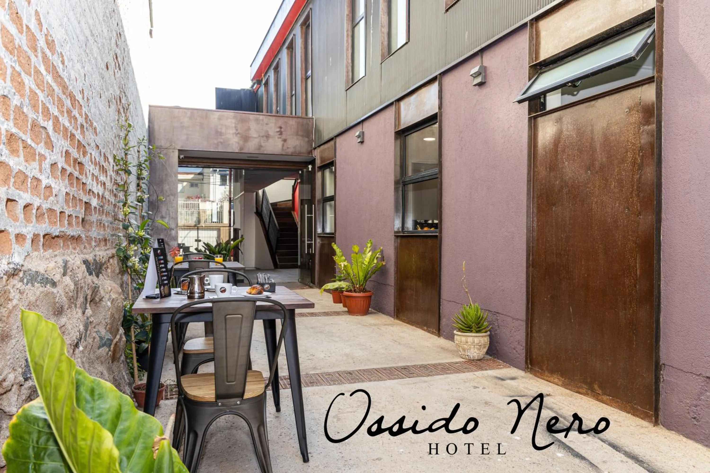 Property building in Hotel Boutique Ossido Nero