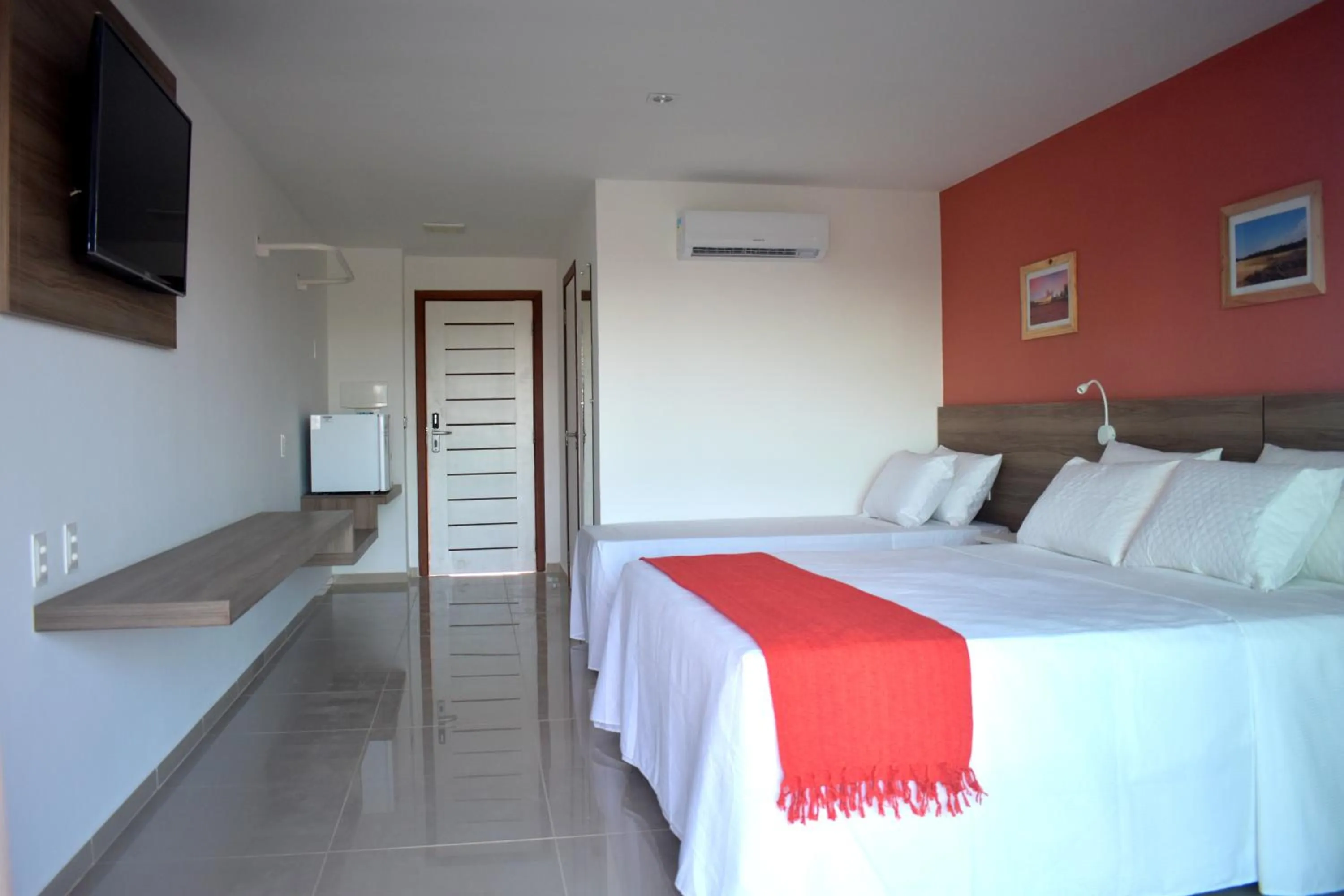 Communal lounge/ TV room, Bed in Eco Privillege Hotel