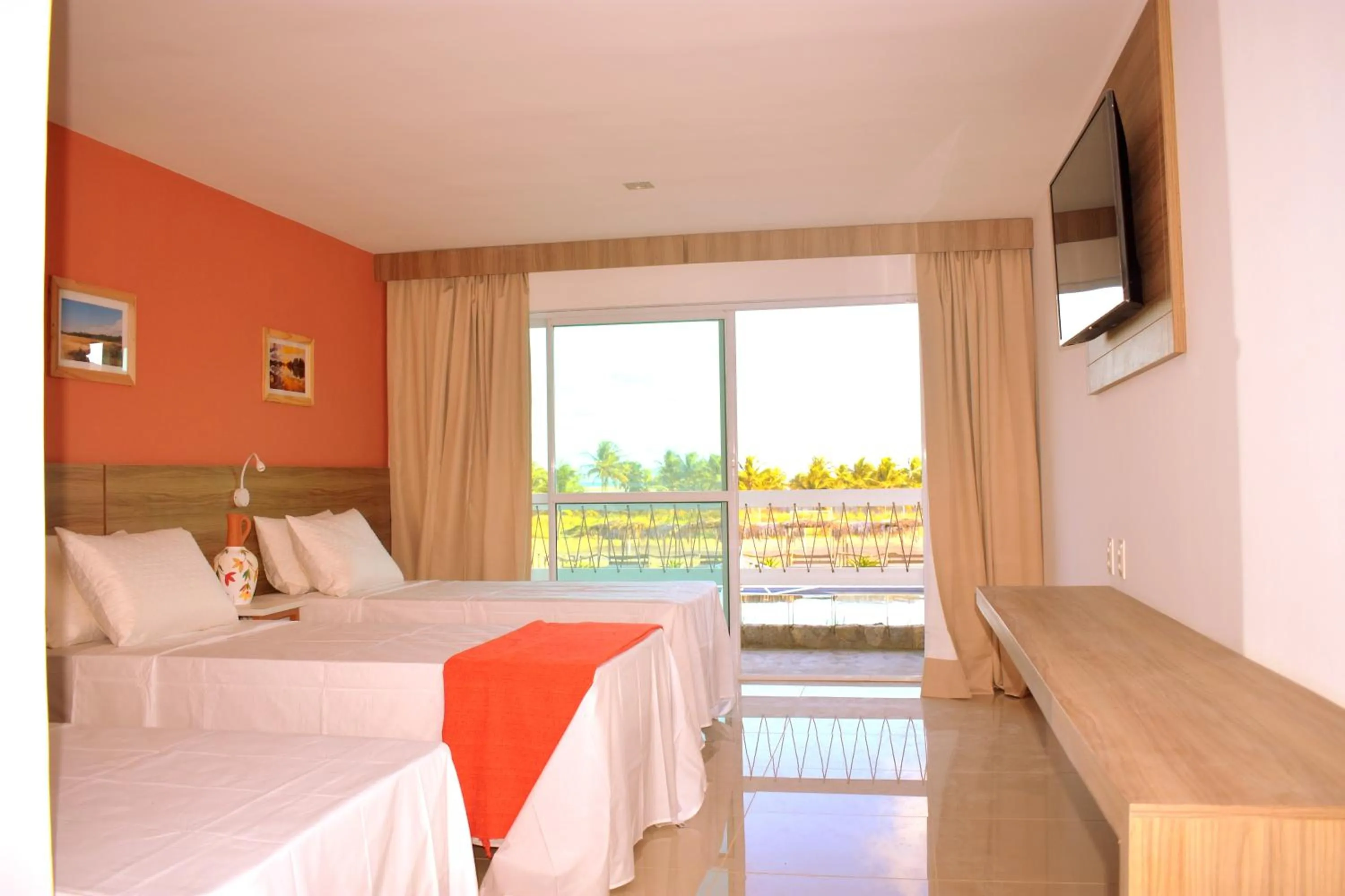 Bed in Eco Privillege Hotel