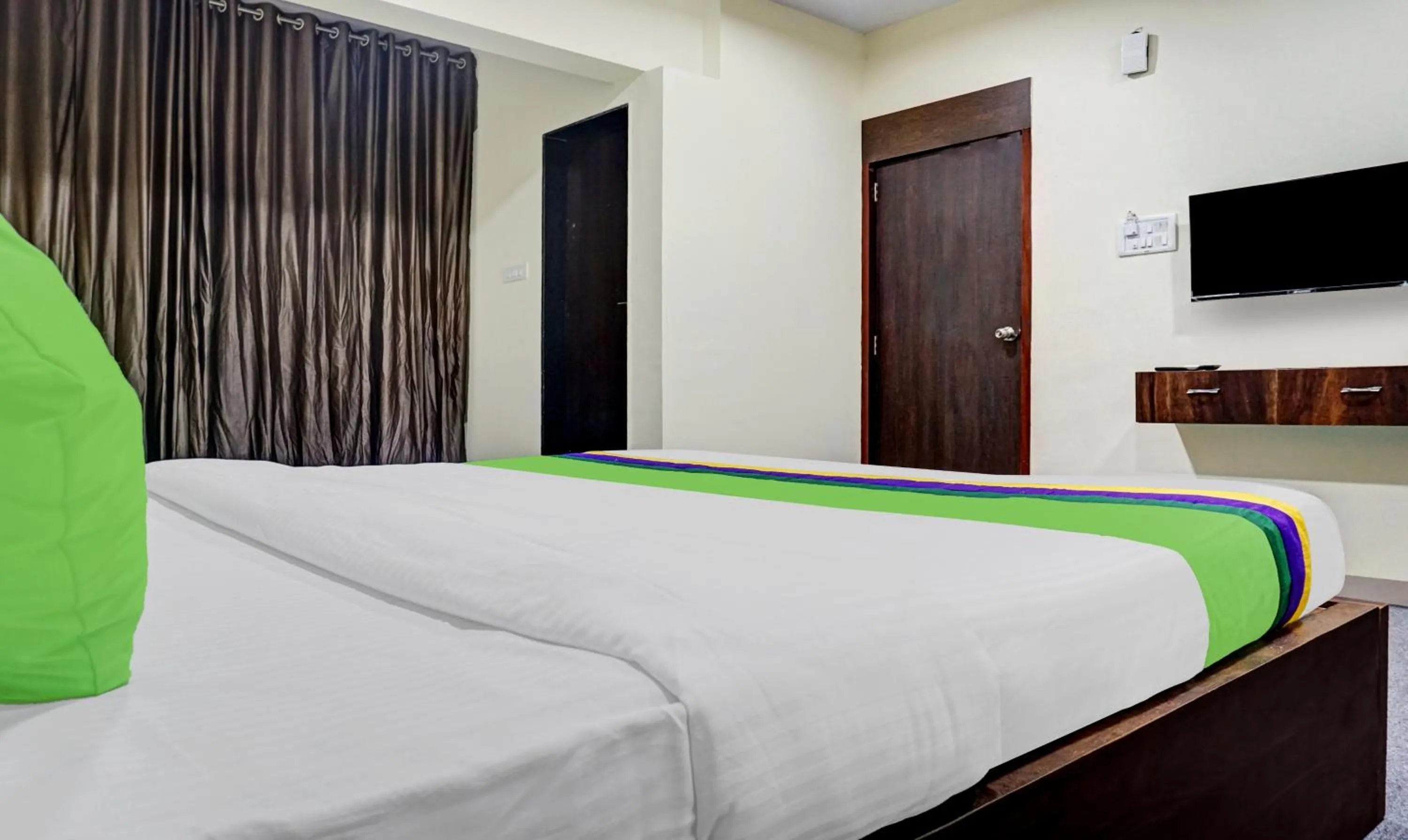 Bedroom, Bed in Treebo Tulip