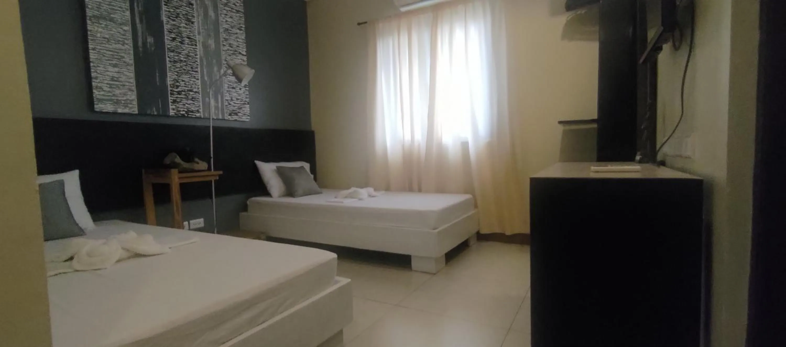 Photo of the whole room in Coron town travellers inn