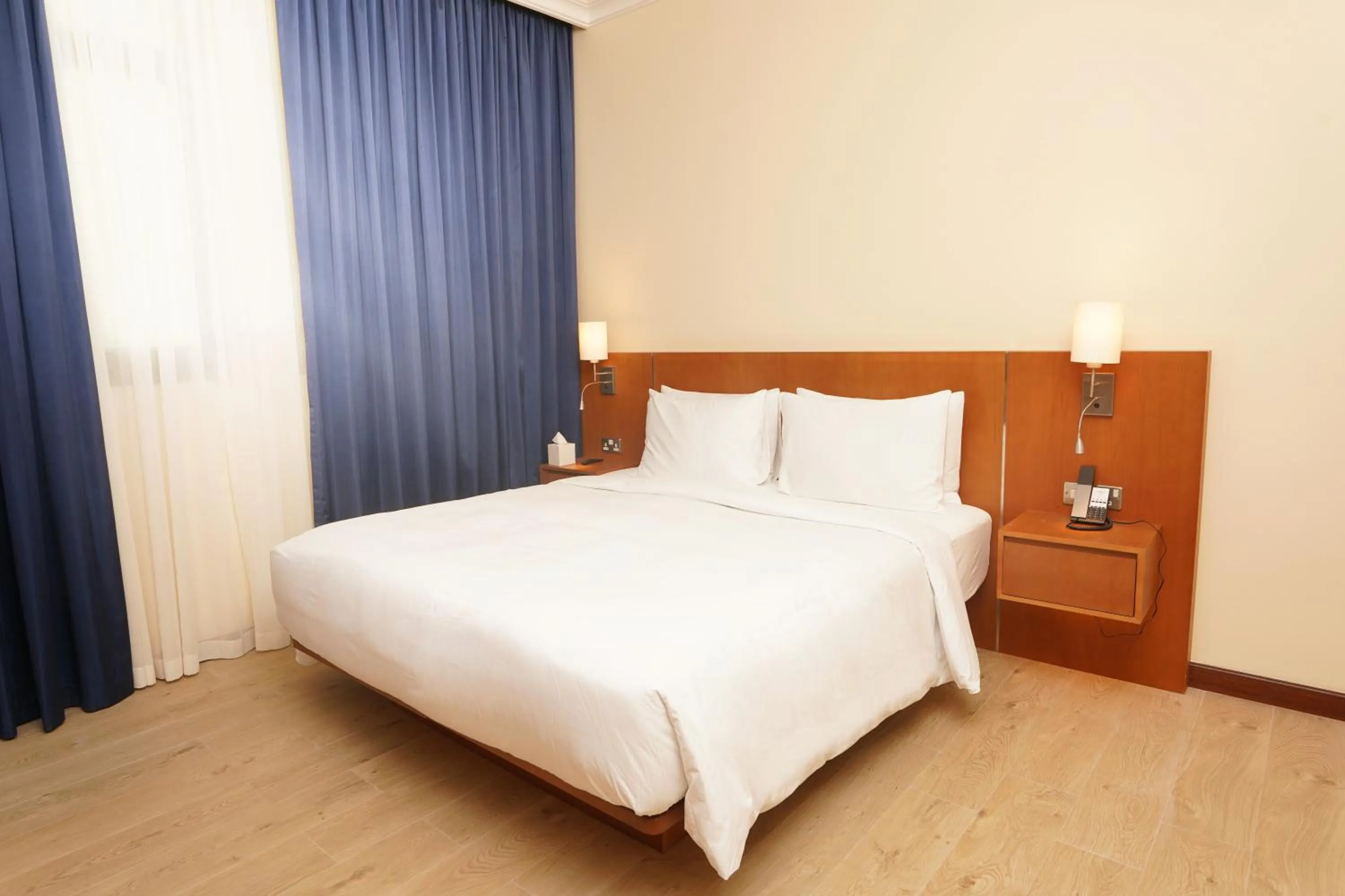 Bed in La Maison Hotel Doha