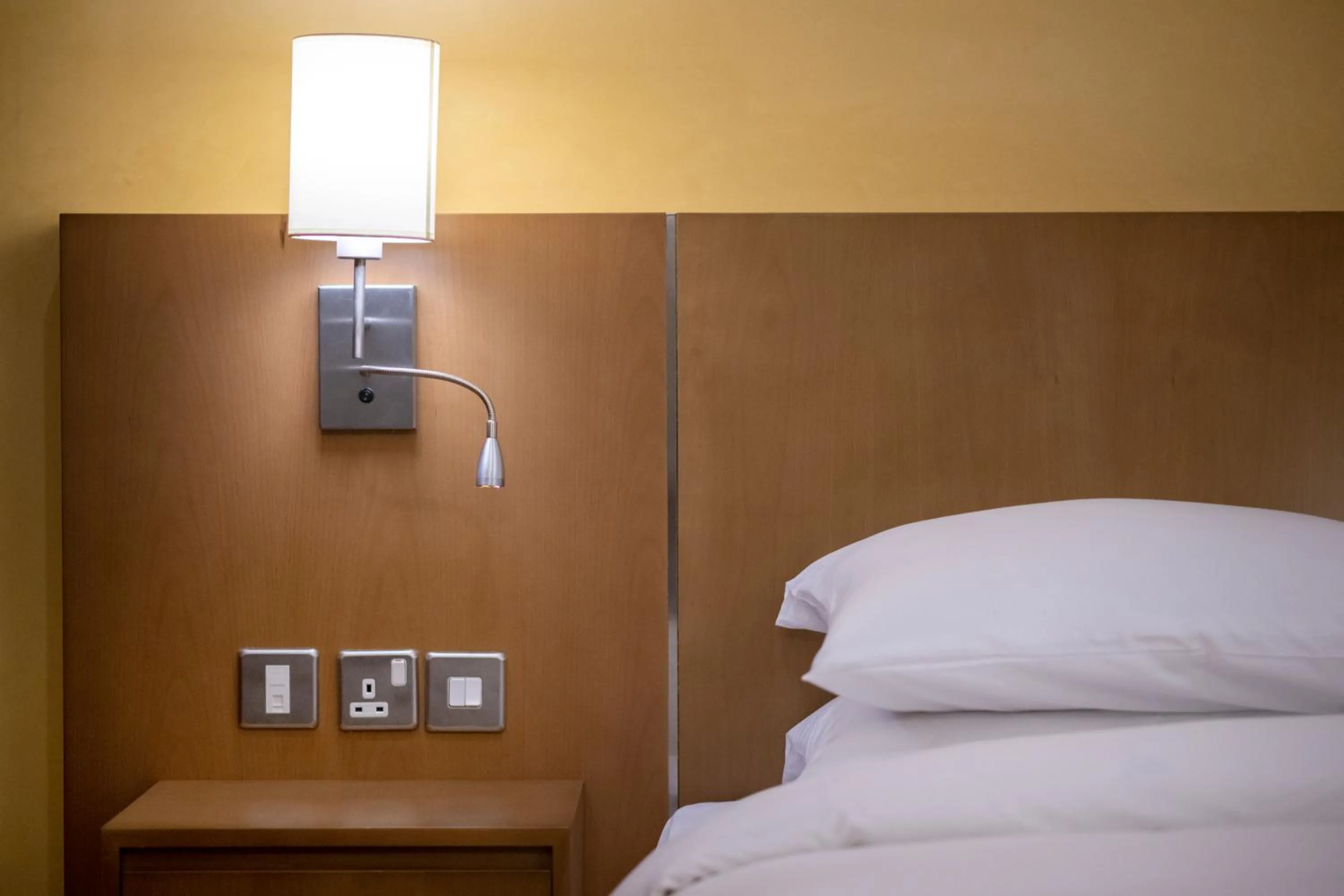 Decorative detail, Bed in La Maison Hotel Doha