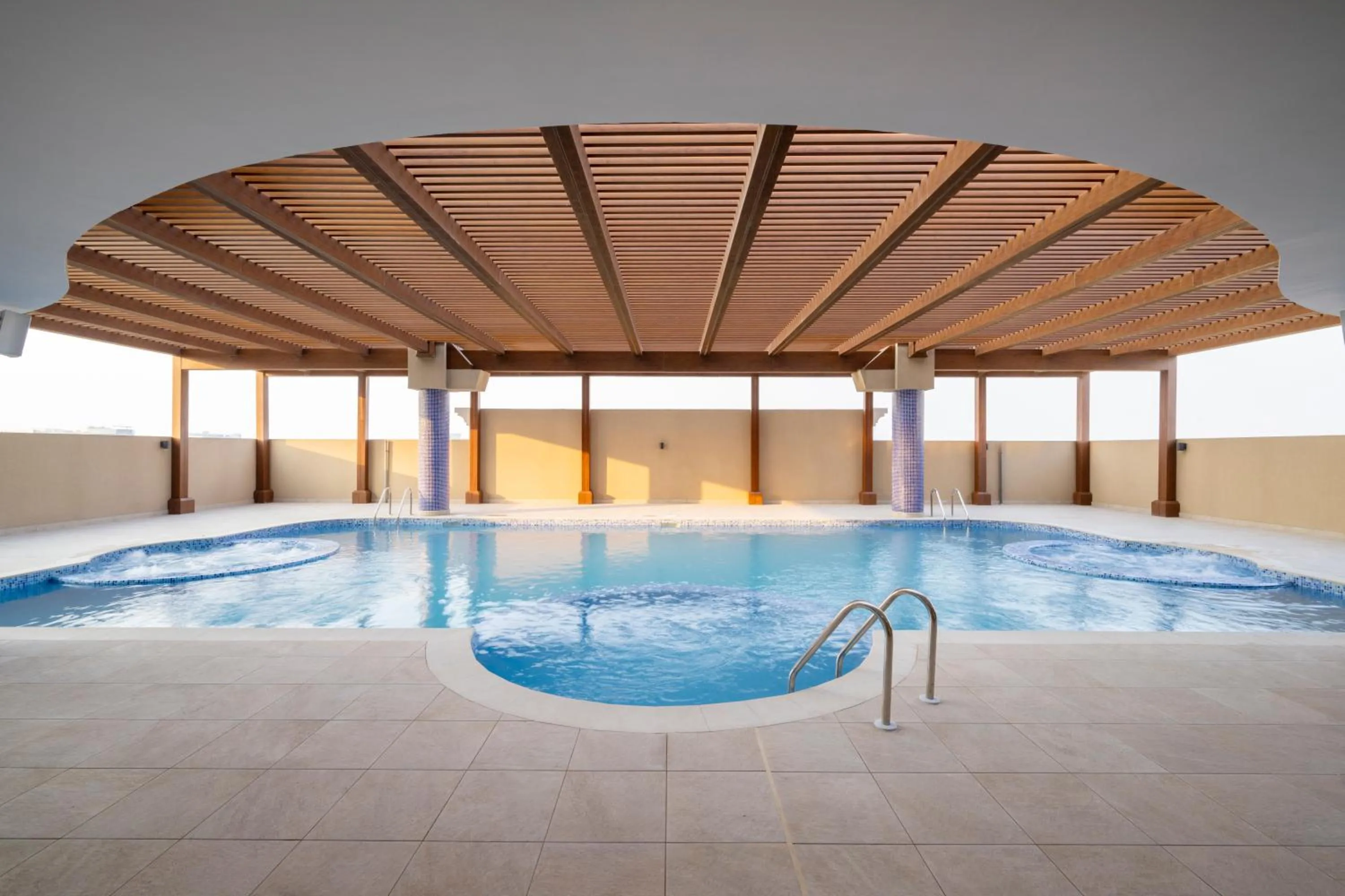 Swimming pool in La Maison Hotel Doha