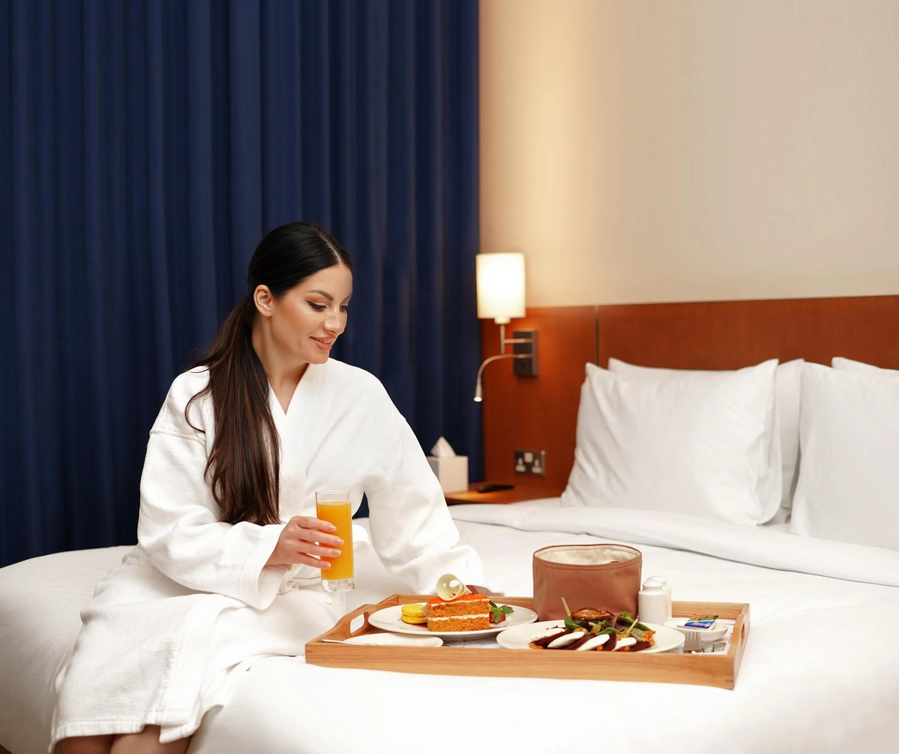 Bed in La Maison Hotel Doha