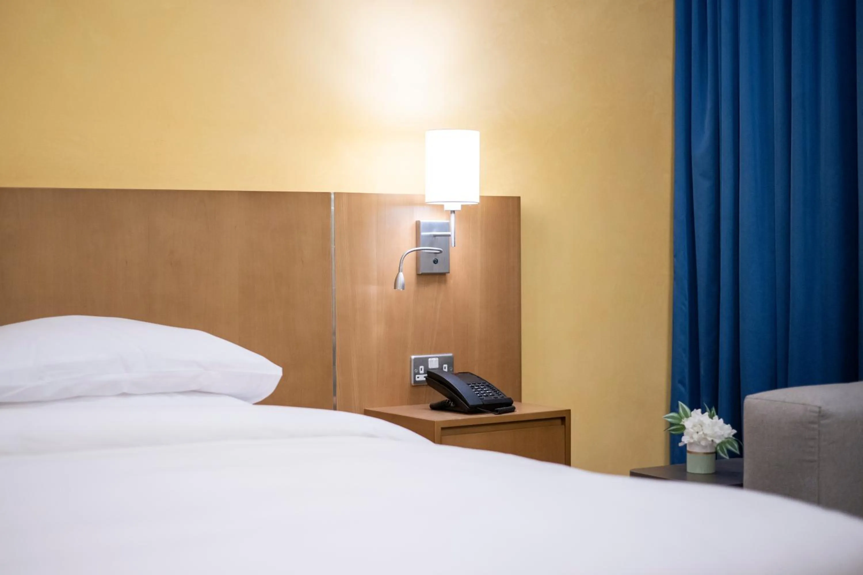 Bed in La Maison Hotel Doha