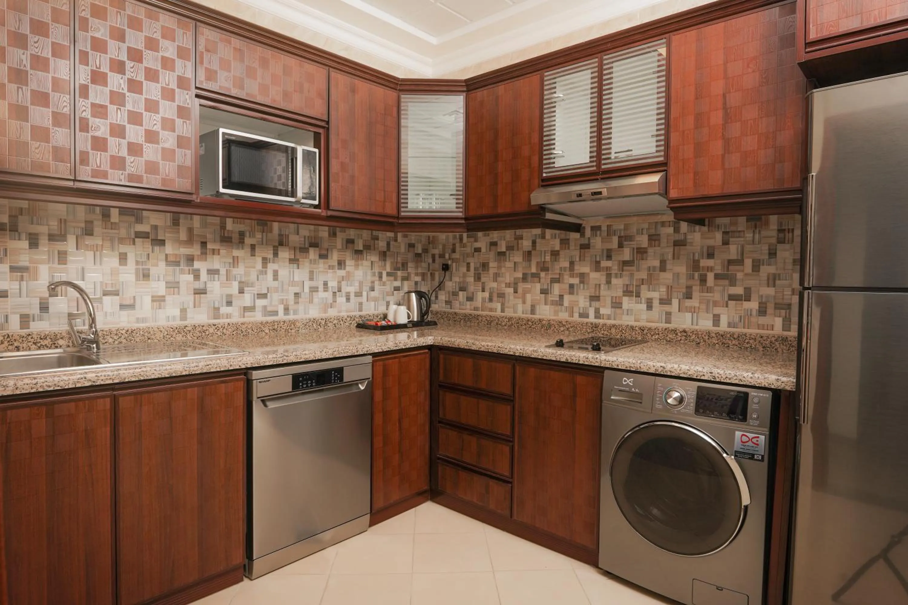 Kitchen or kitchenette in La Maison Hotel Doha