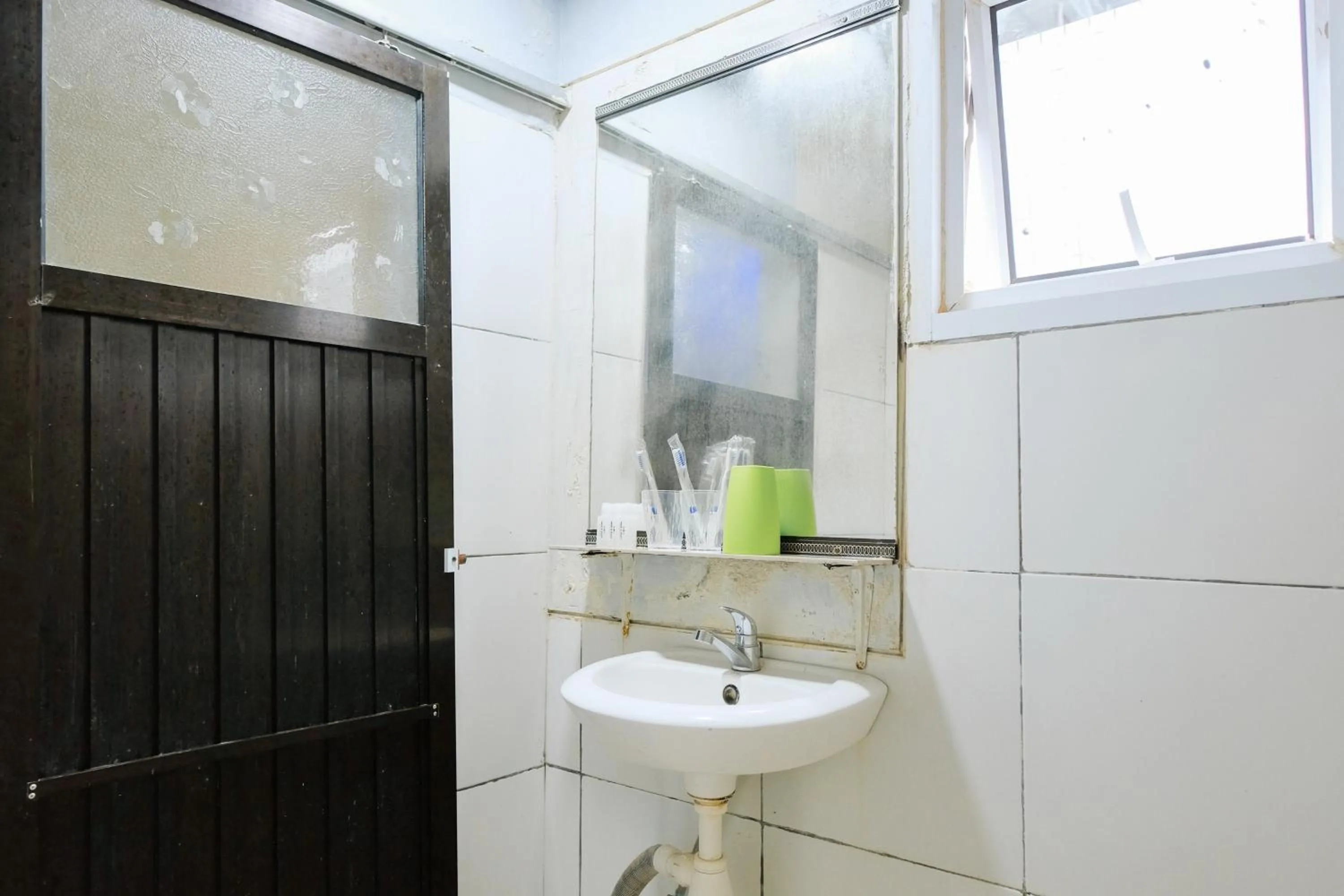 Bathroom in Sans Hotel Havila Bengkulu