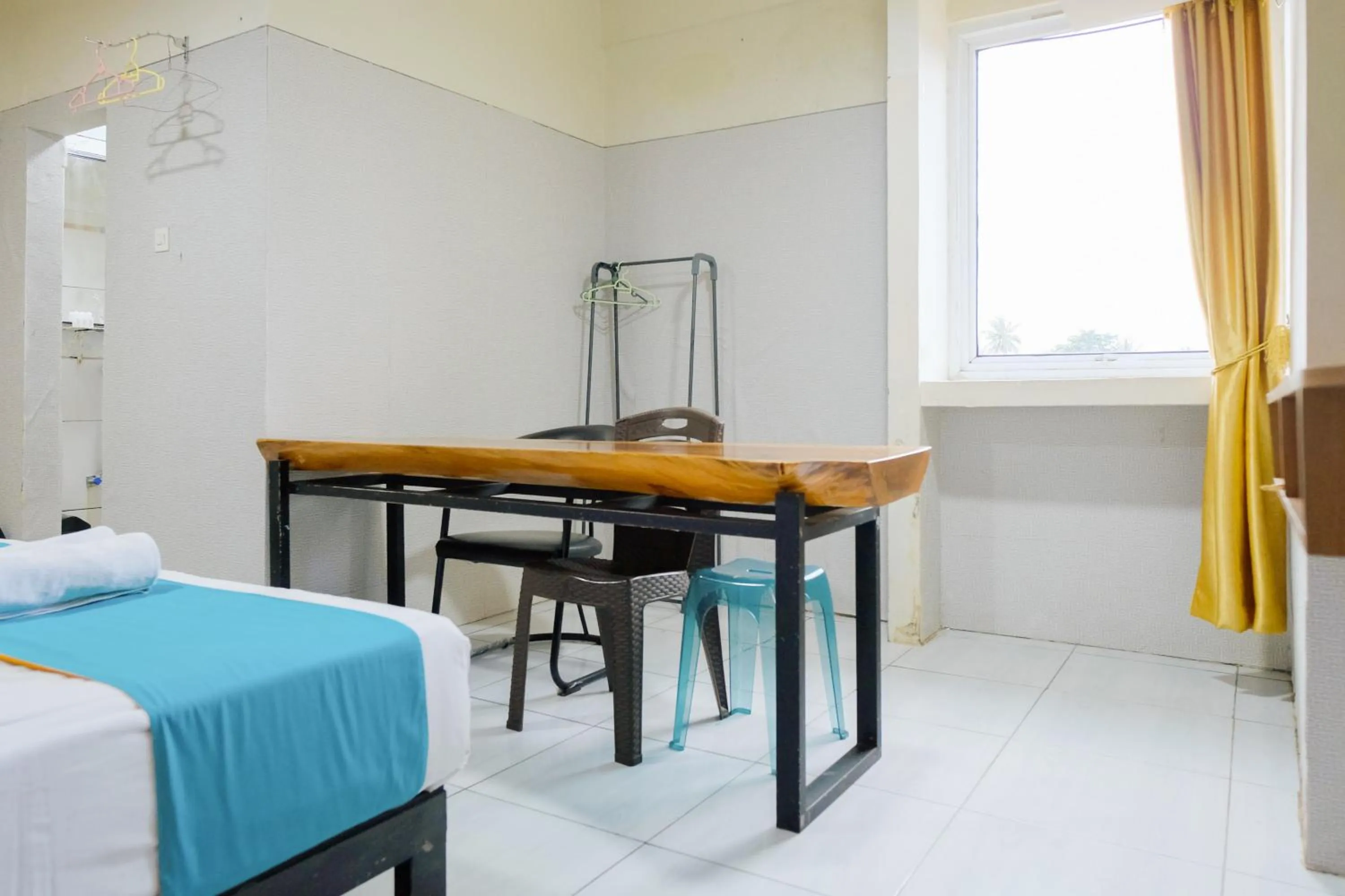 Bedroom, Bed in Sans Hotel Havila Bengkulu