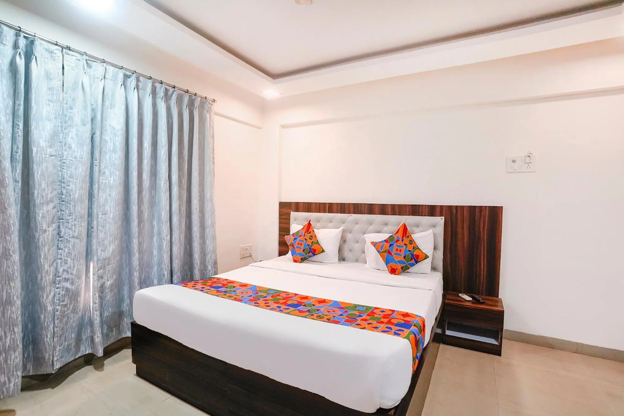 Bed in FabHotel Arsh Executive Inn