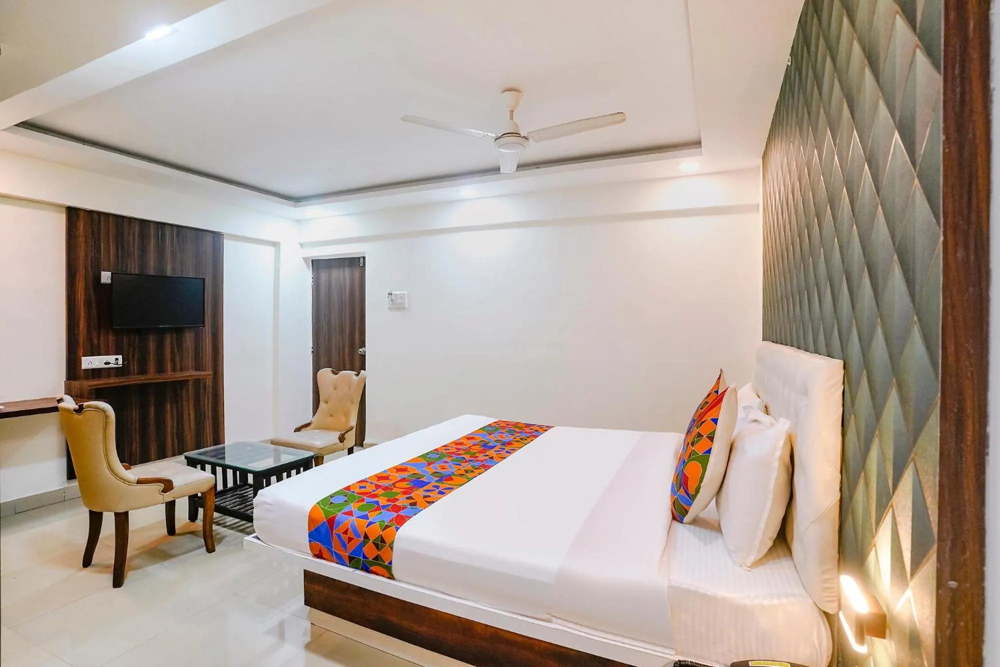 Bed in FabHotel Arsh Executive Inn