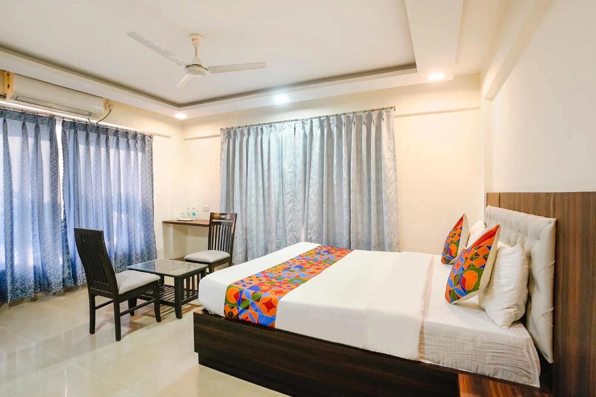 Bed in FabHotel Arsh Executive Inn