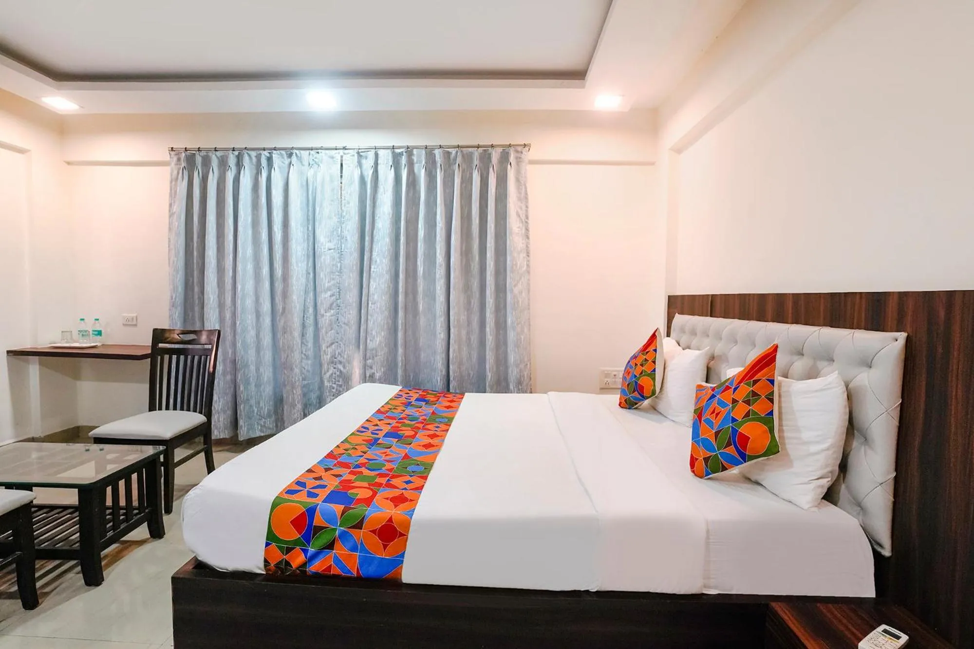 Bed in FabHotel Arsh Executive Inn