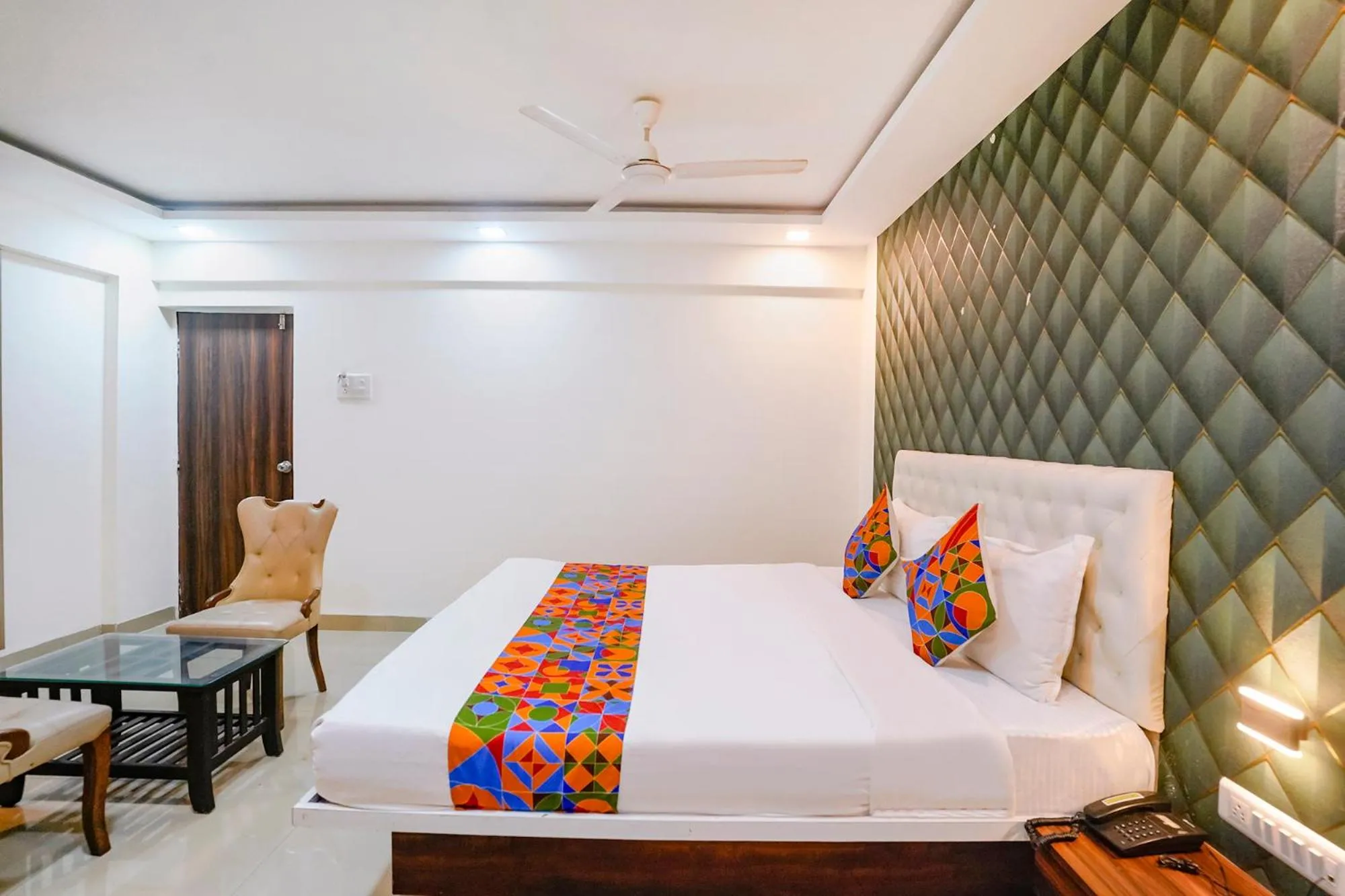 Bed in FabHotel Arsh Executive Inn