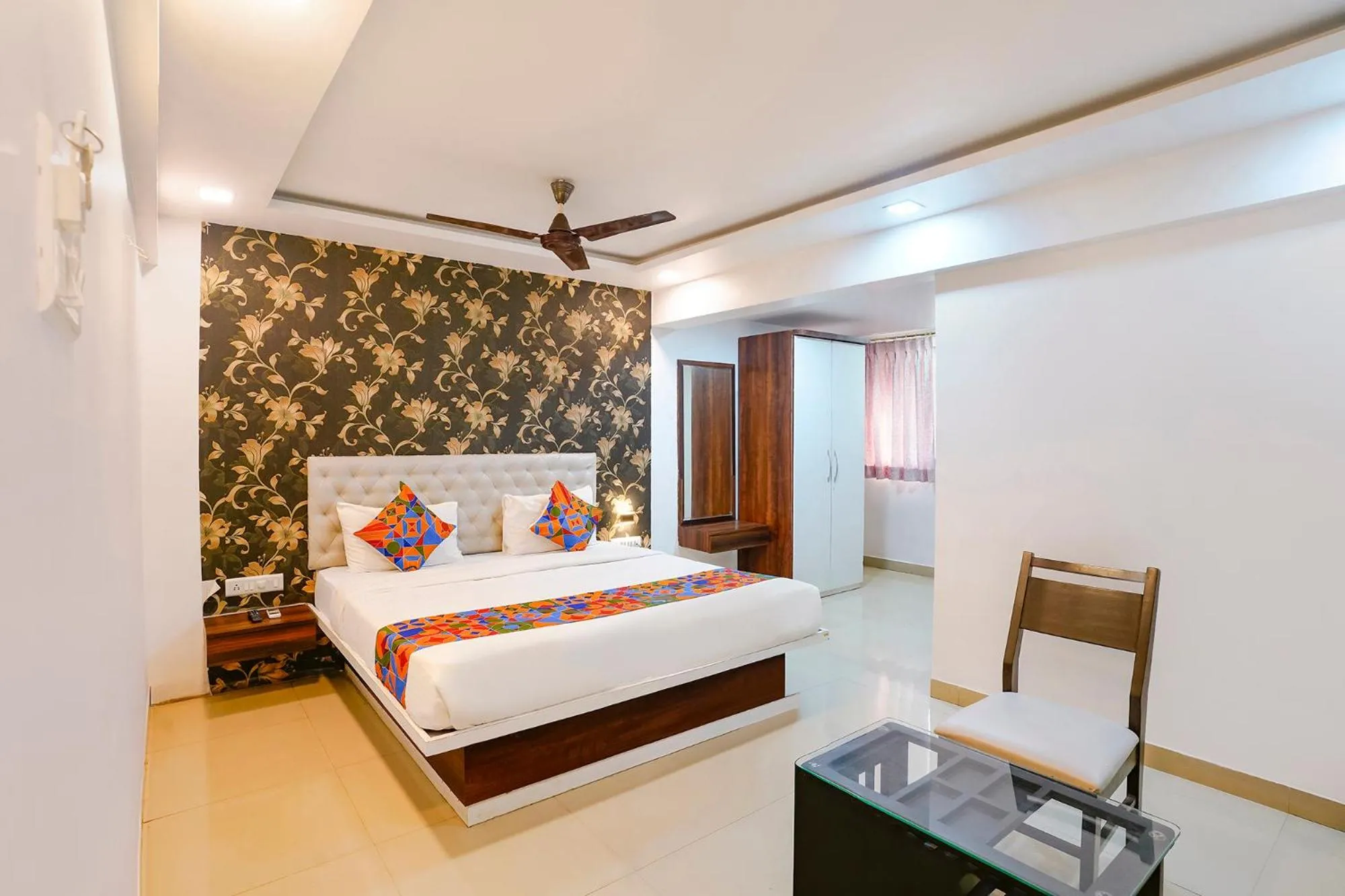 Bed in FabHotel Arsh Executive Inn