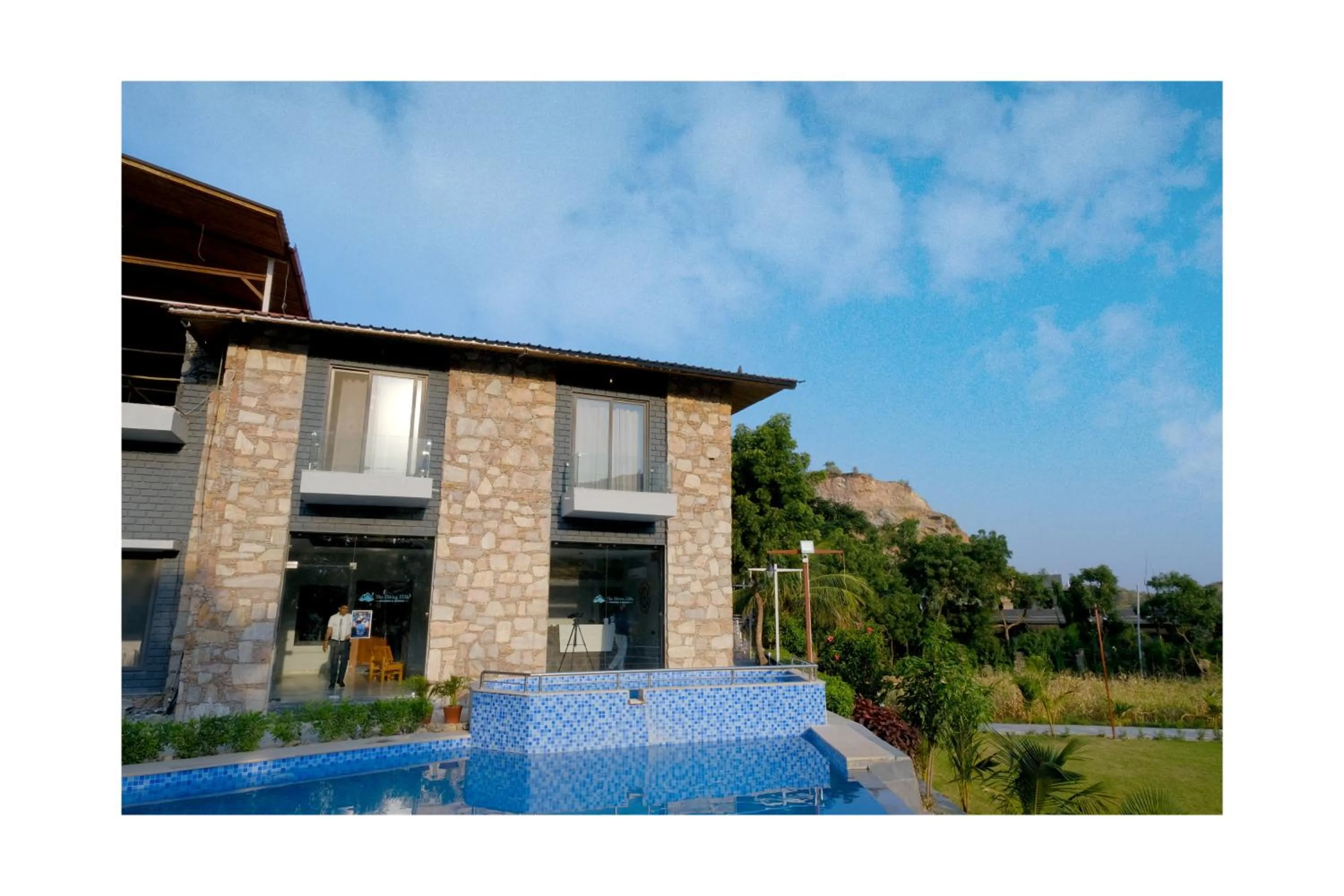 Garden, Swimming Pool in The Divine Hills Resort