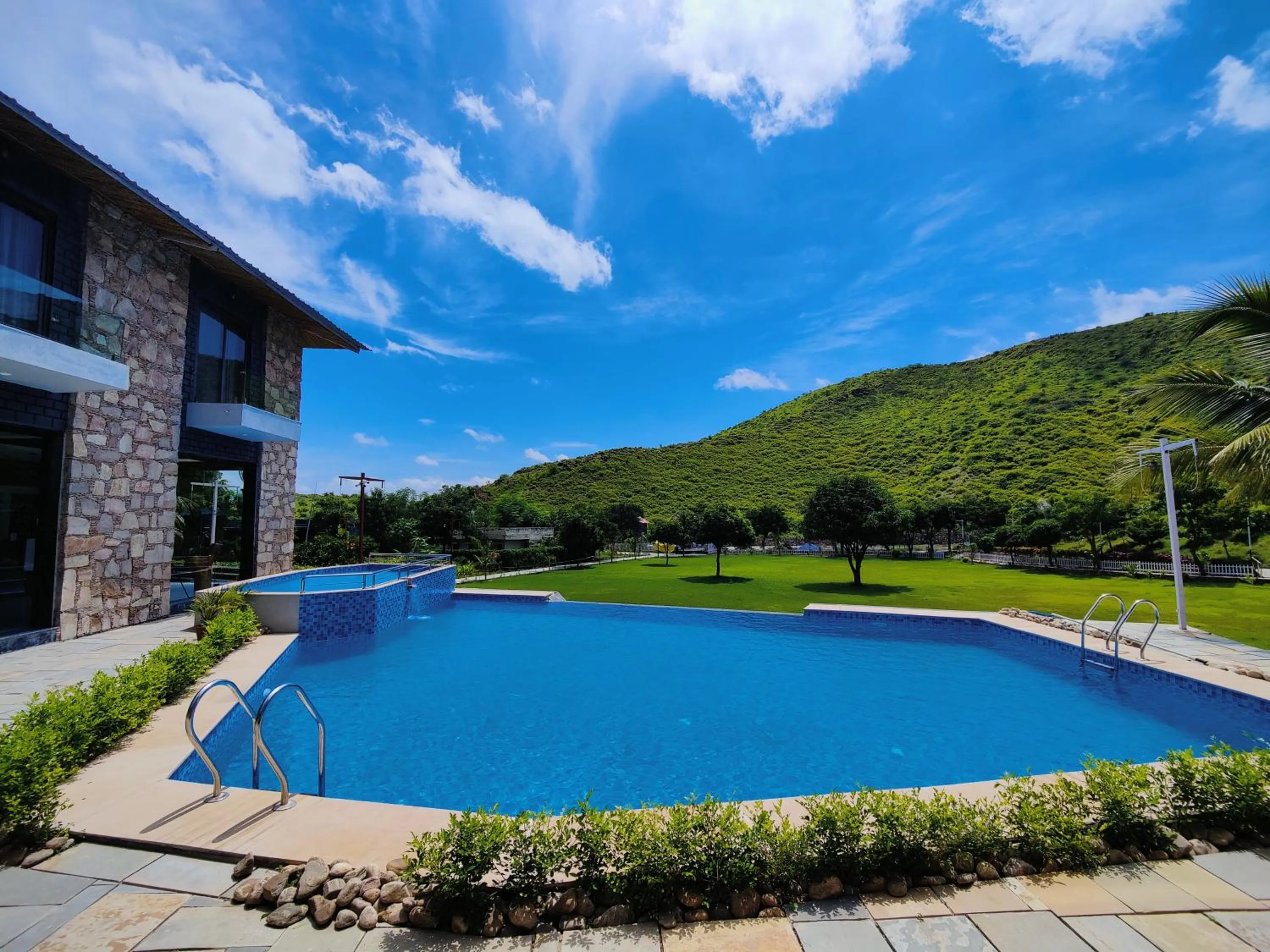 Property building, Swimming Pool in The Divine Hills Resort