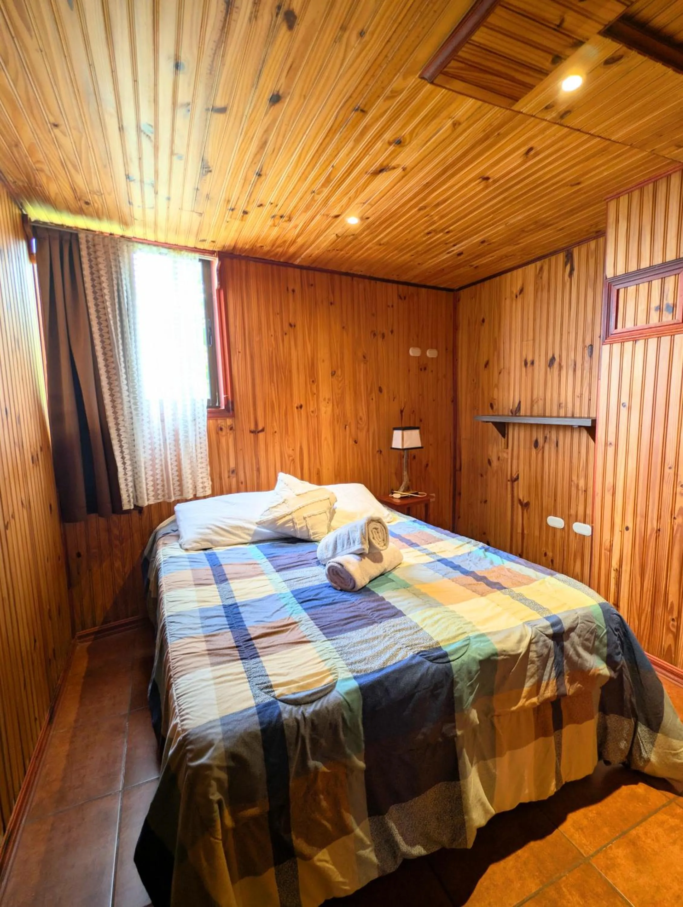 Bed in Miztli Lodge & Adventure