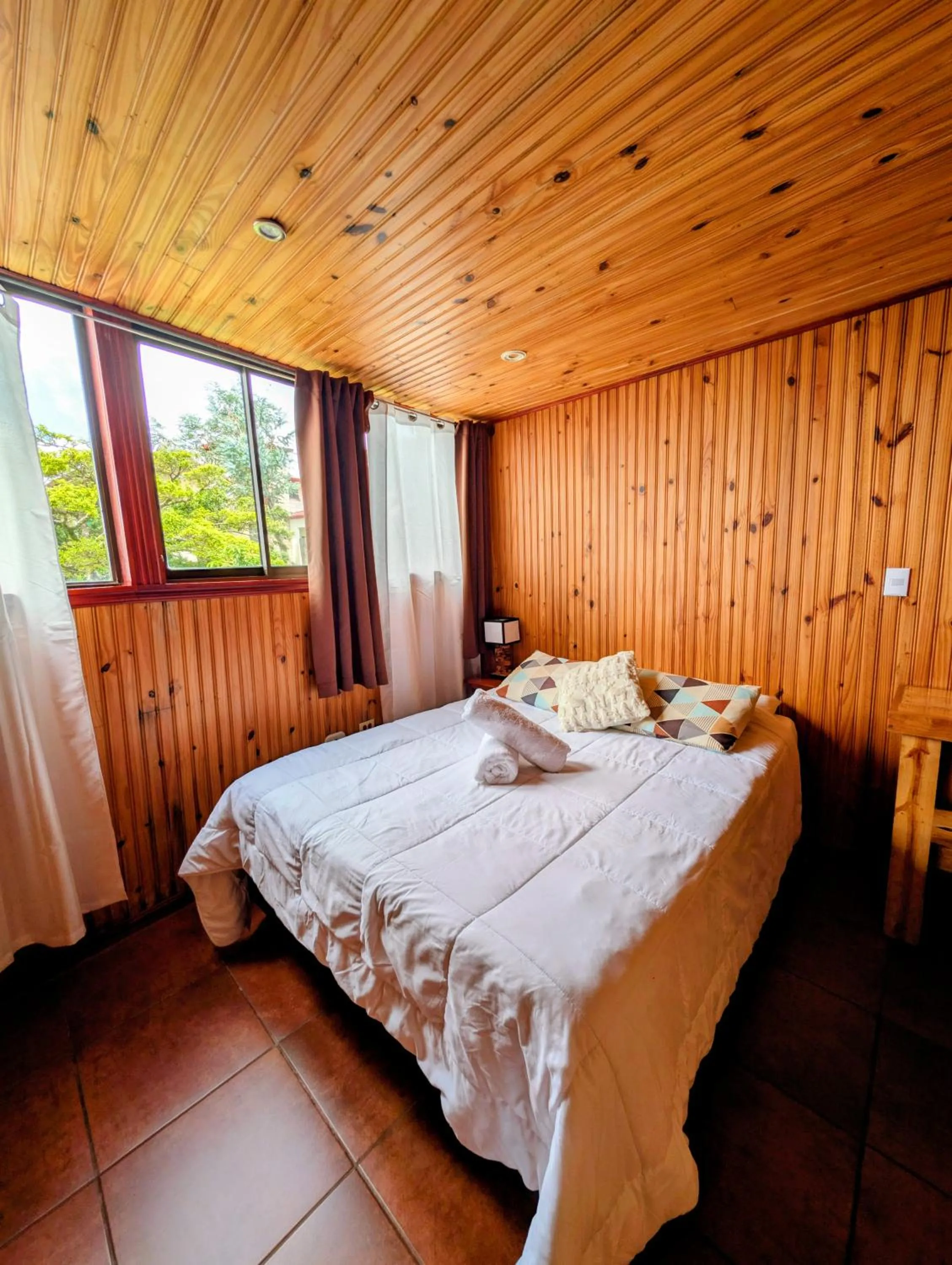 Bed in Miztli Lodge & Adventure