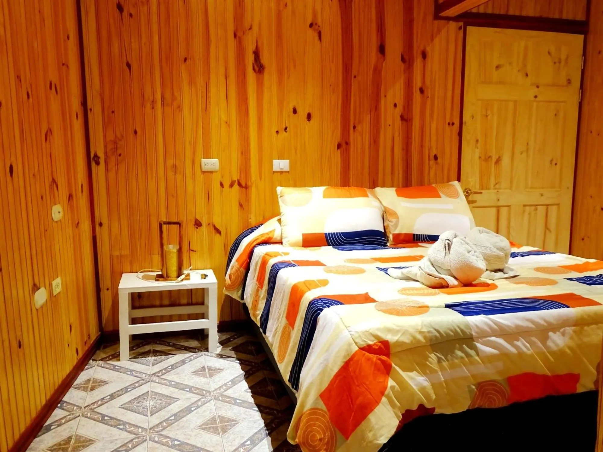 Bed in Miztli Lodge & Adventure