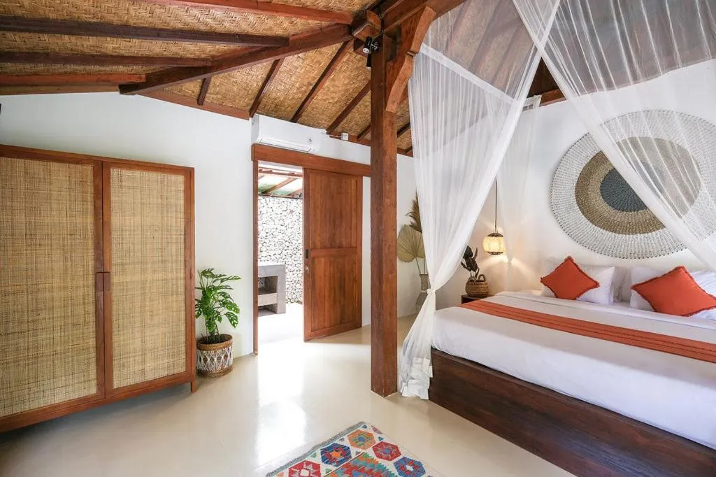Bed in Kayu Mama Resort and Spa