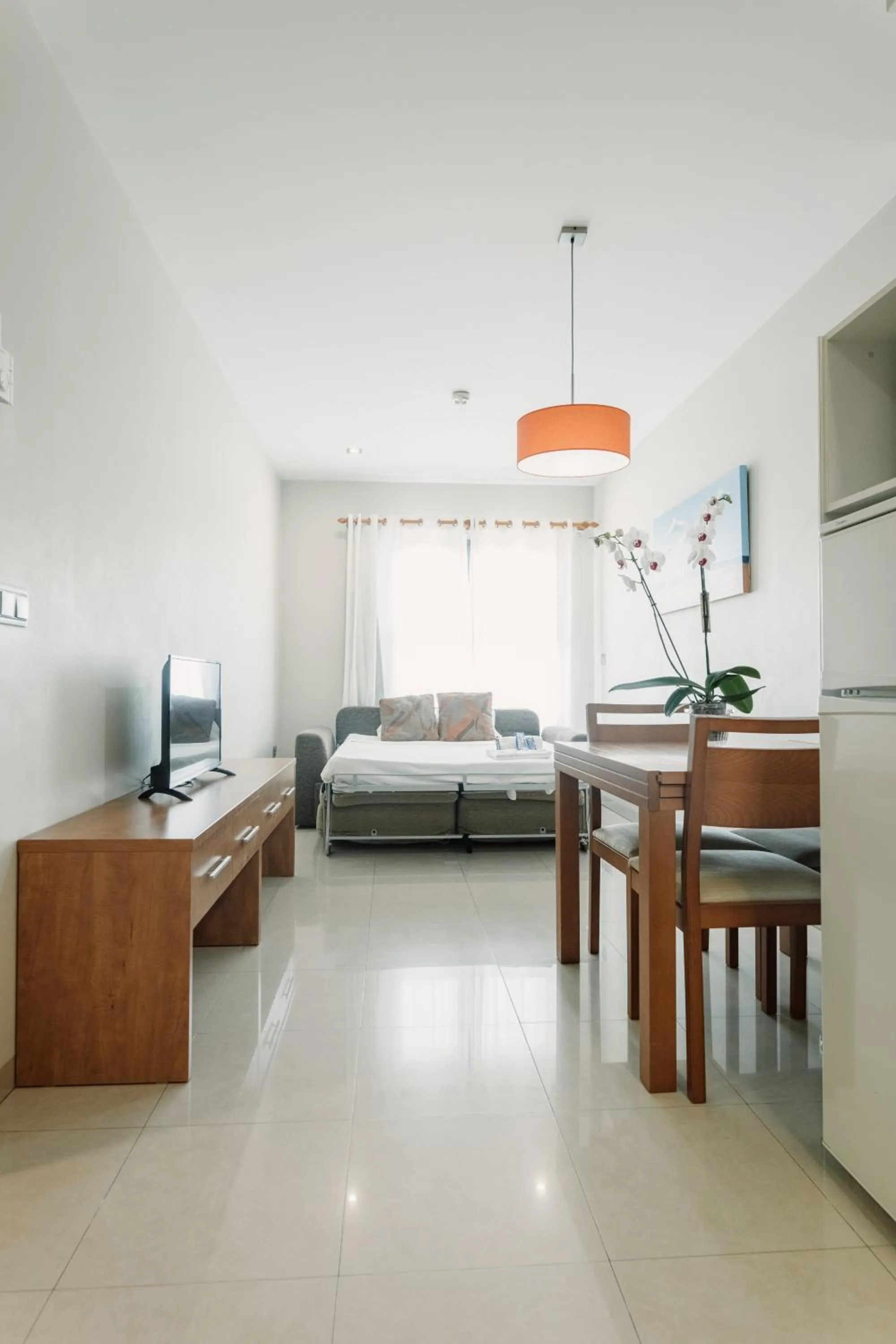 Seating area, Bed in Aparthotel Bahía