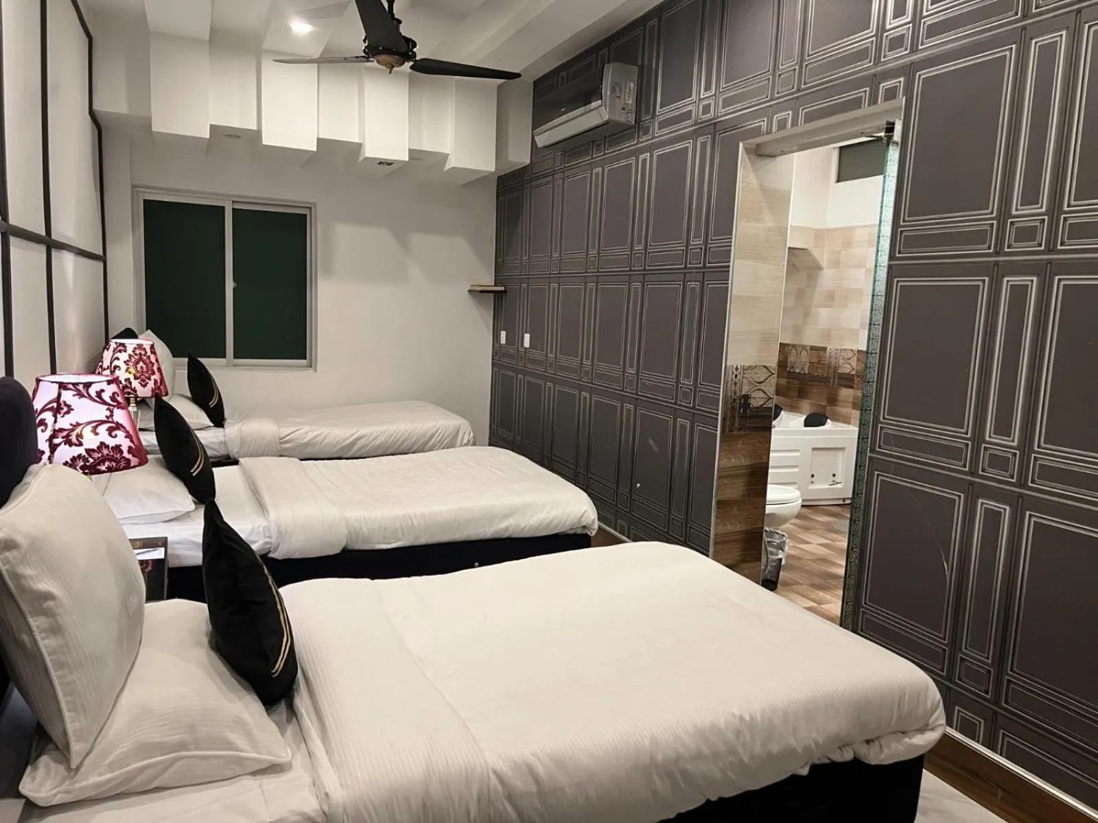 Photo of the whole room, Bed in Lawrence View Hotel, Lahore