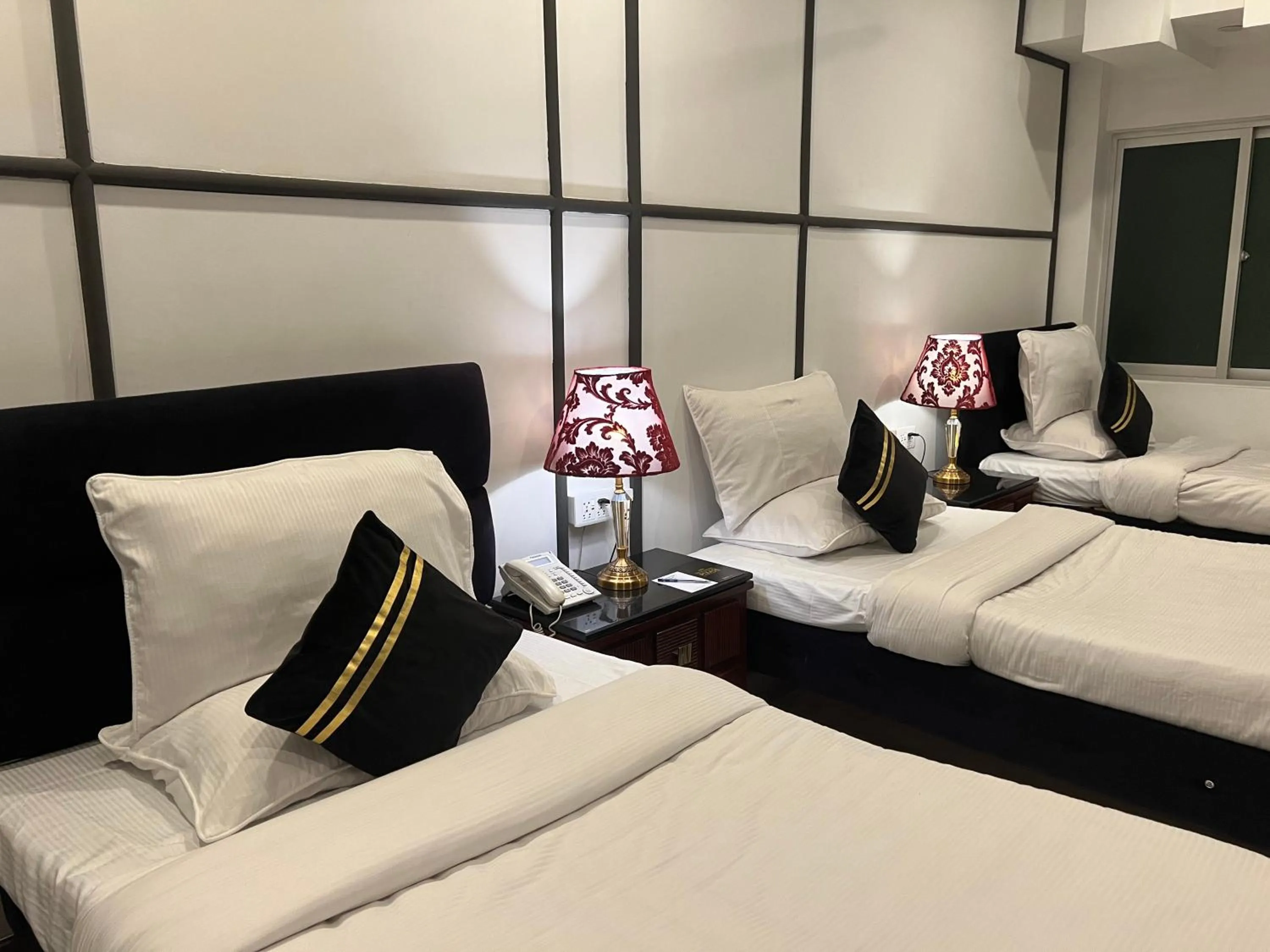 Bed in Lawrence View Hotel, Lahore