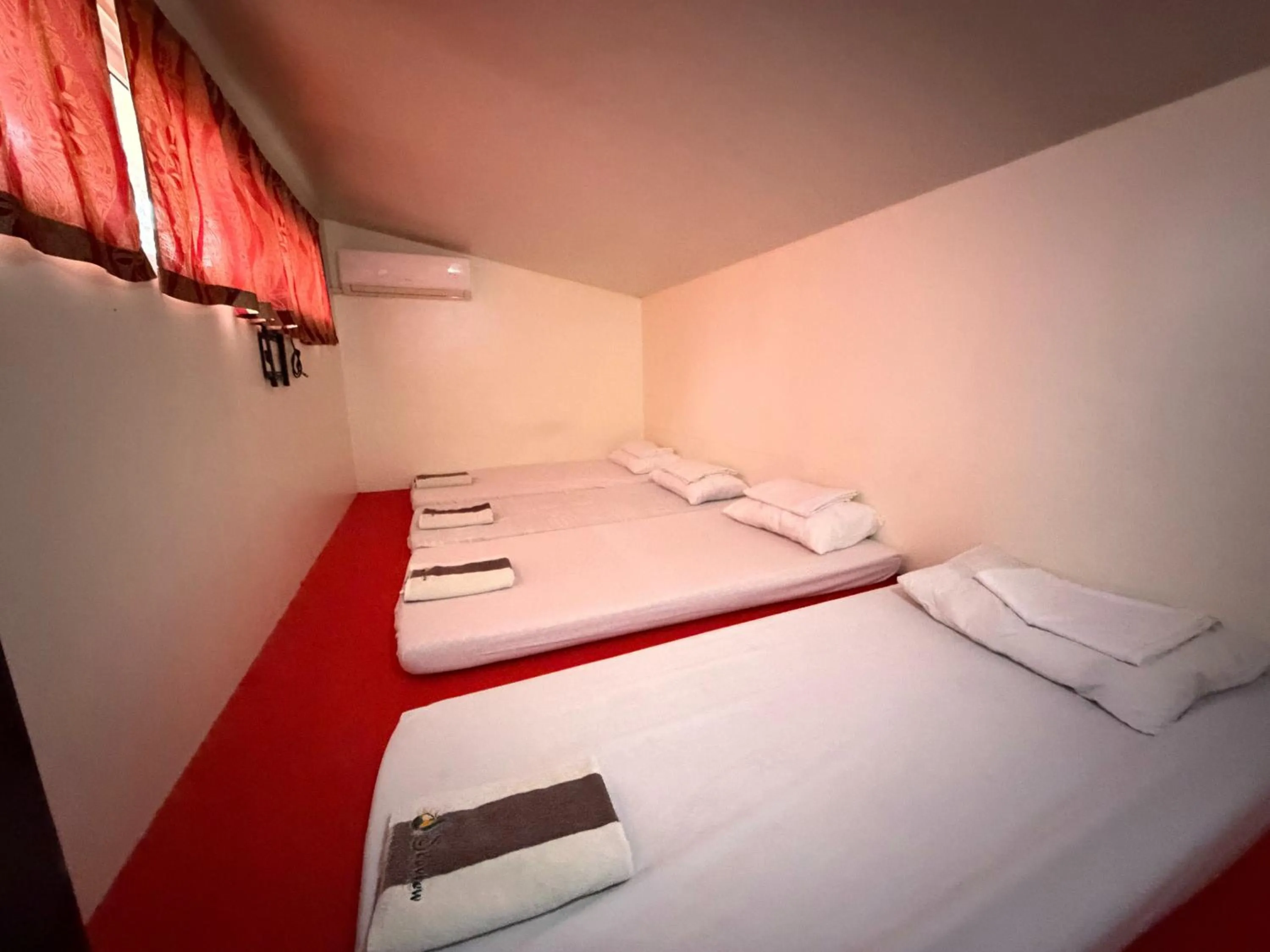 Bed in SEAVIEW BEACH RESORT