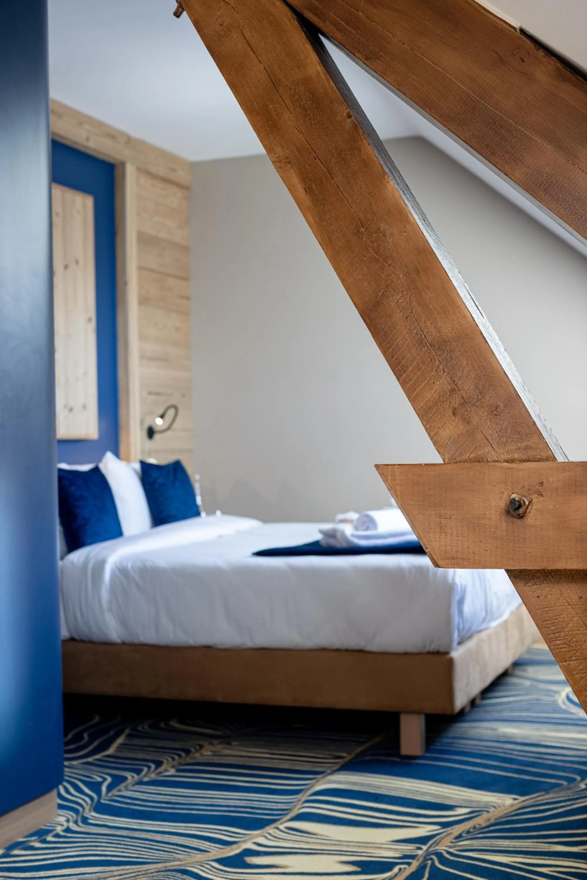 Bed in Madame Vacances Hotel Les Cimes