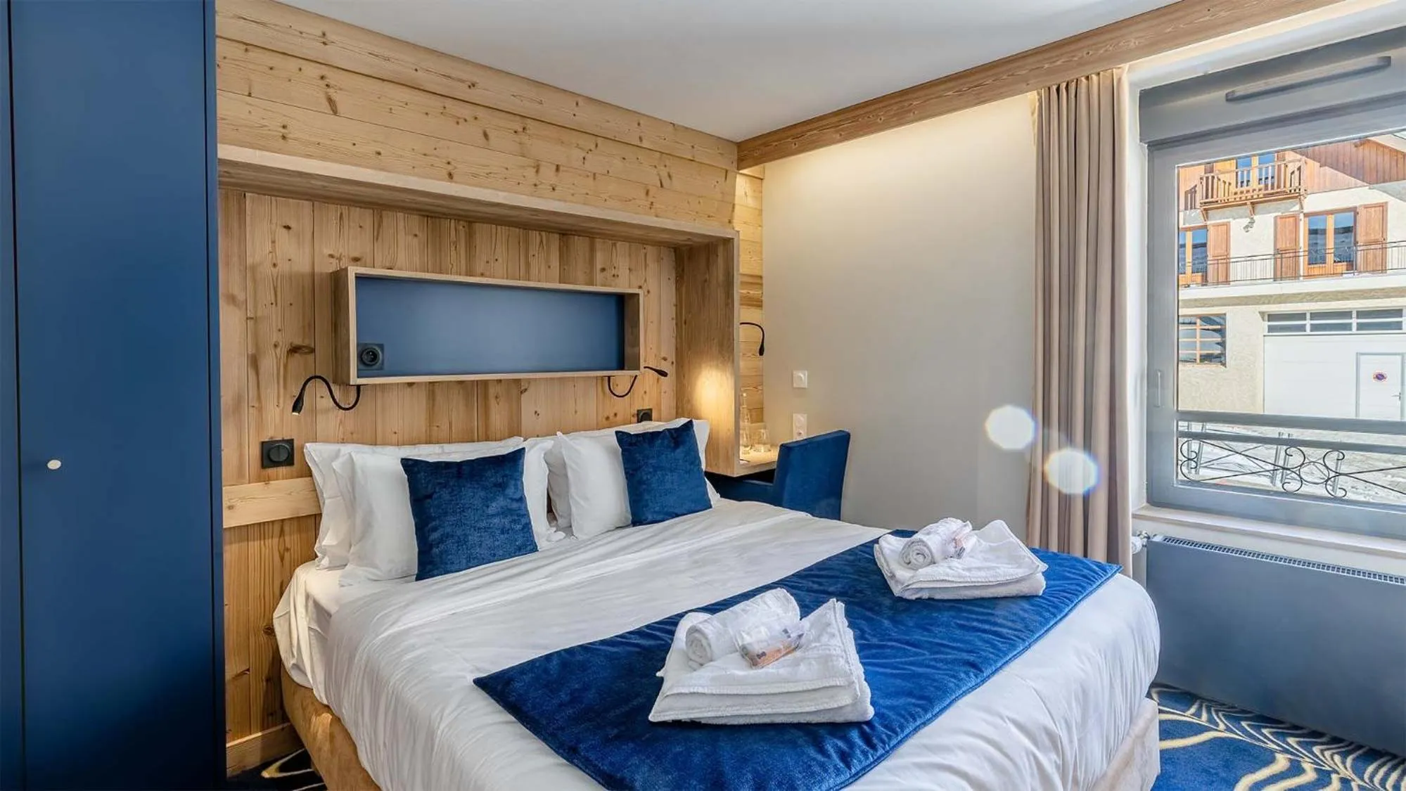 Bed in Madame Vacances Hotel Les Cimes